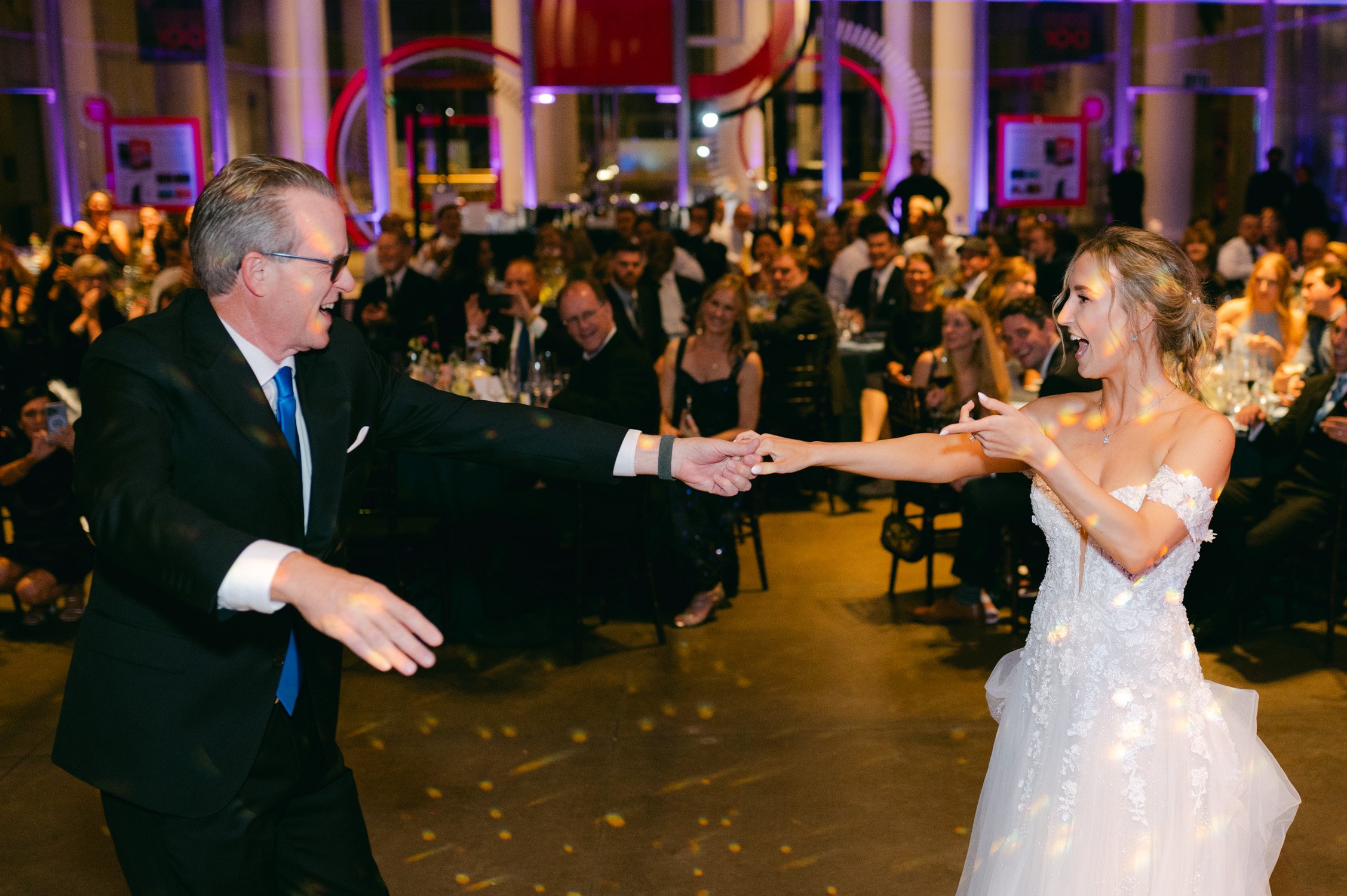 California academy of Sciences in San Francisco Wedding, photo of the bride and her dad dancing