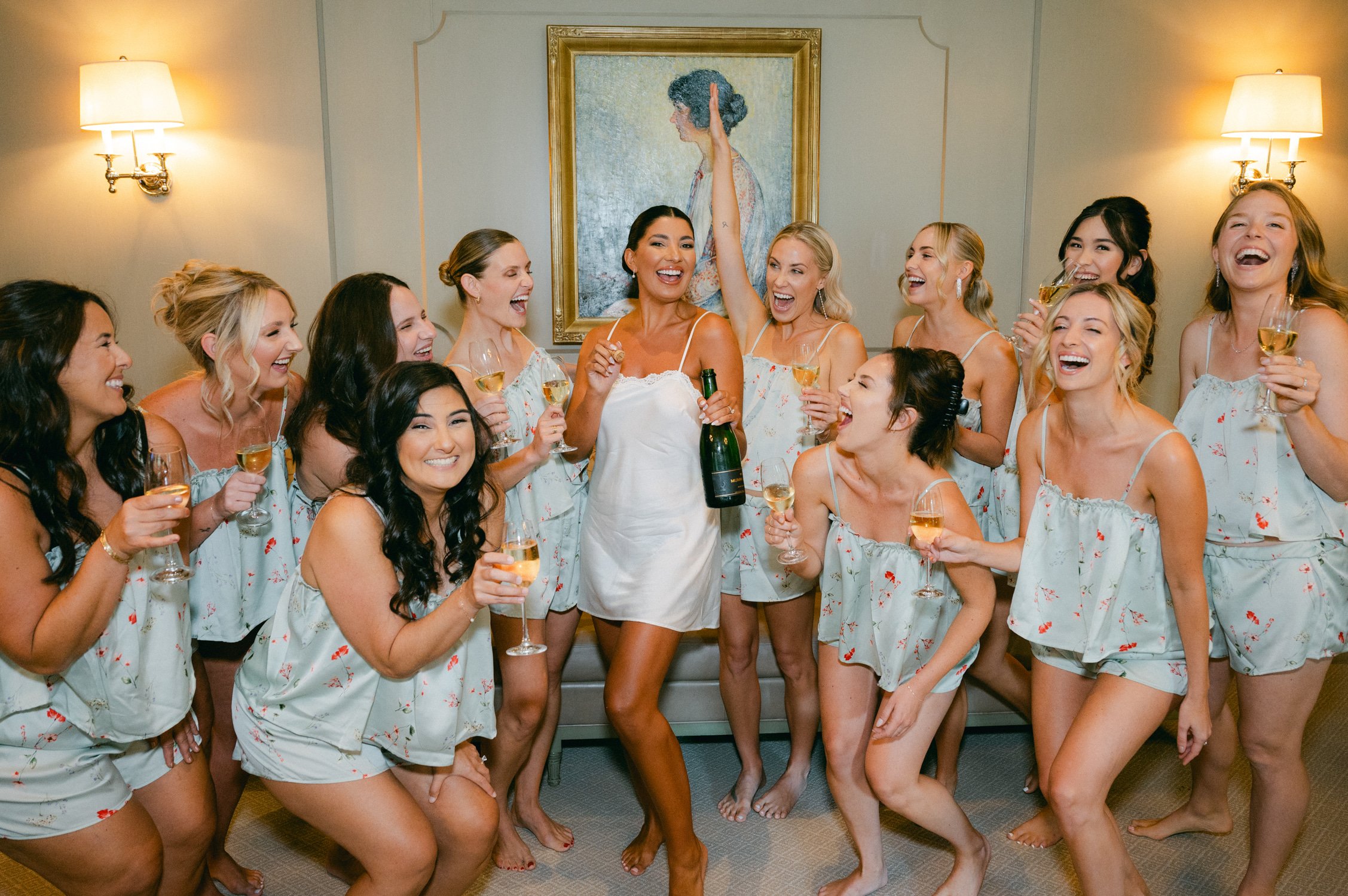 Martis Camp Wedding, photo of the bride and bridesmaids drinking champagne before the wedding