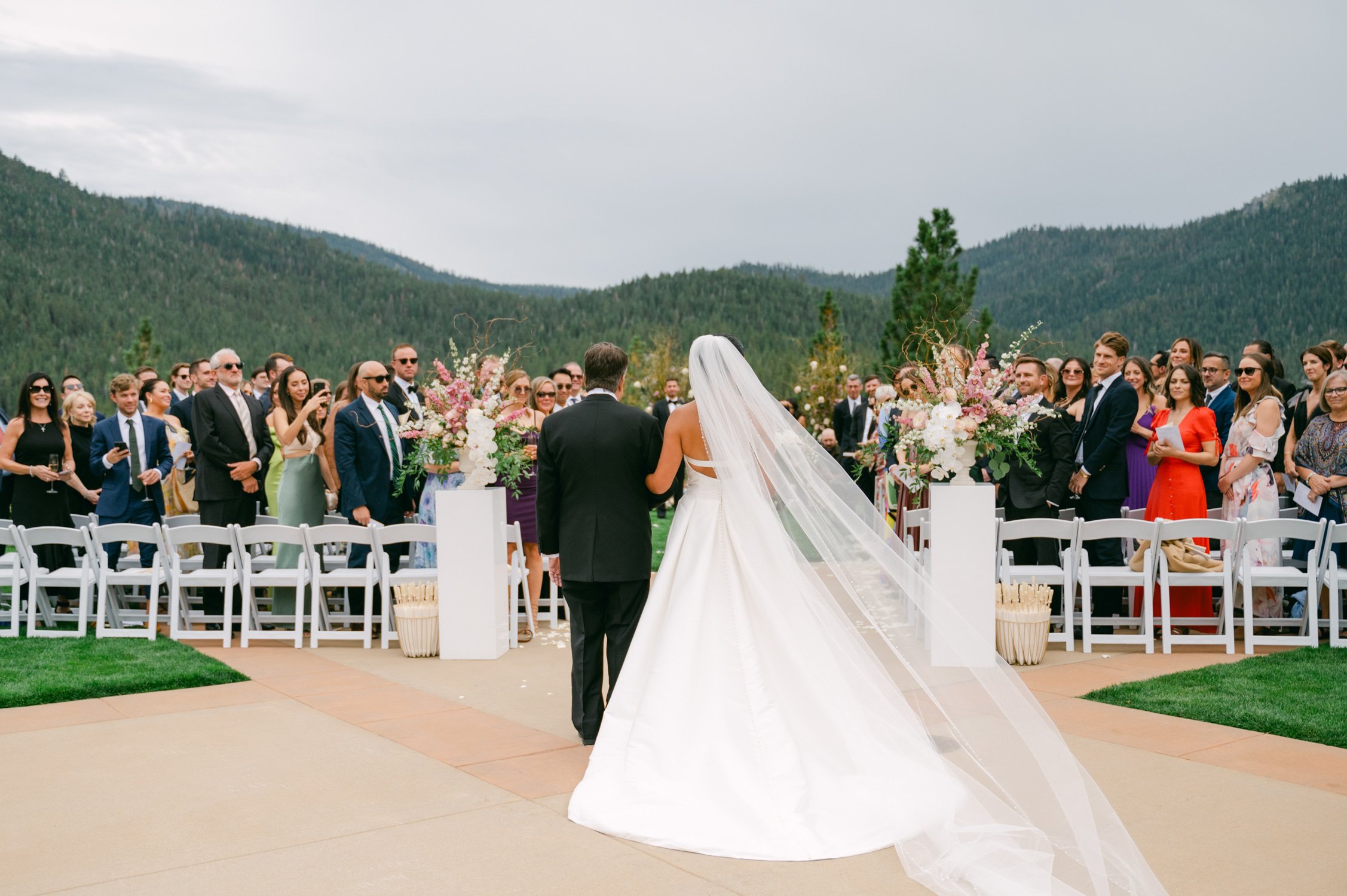 Martis Camp Wedding, photo of the bride with her father walking down the aisle