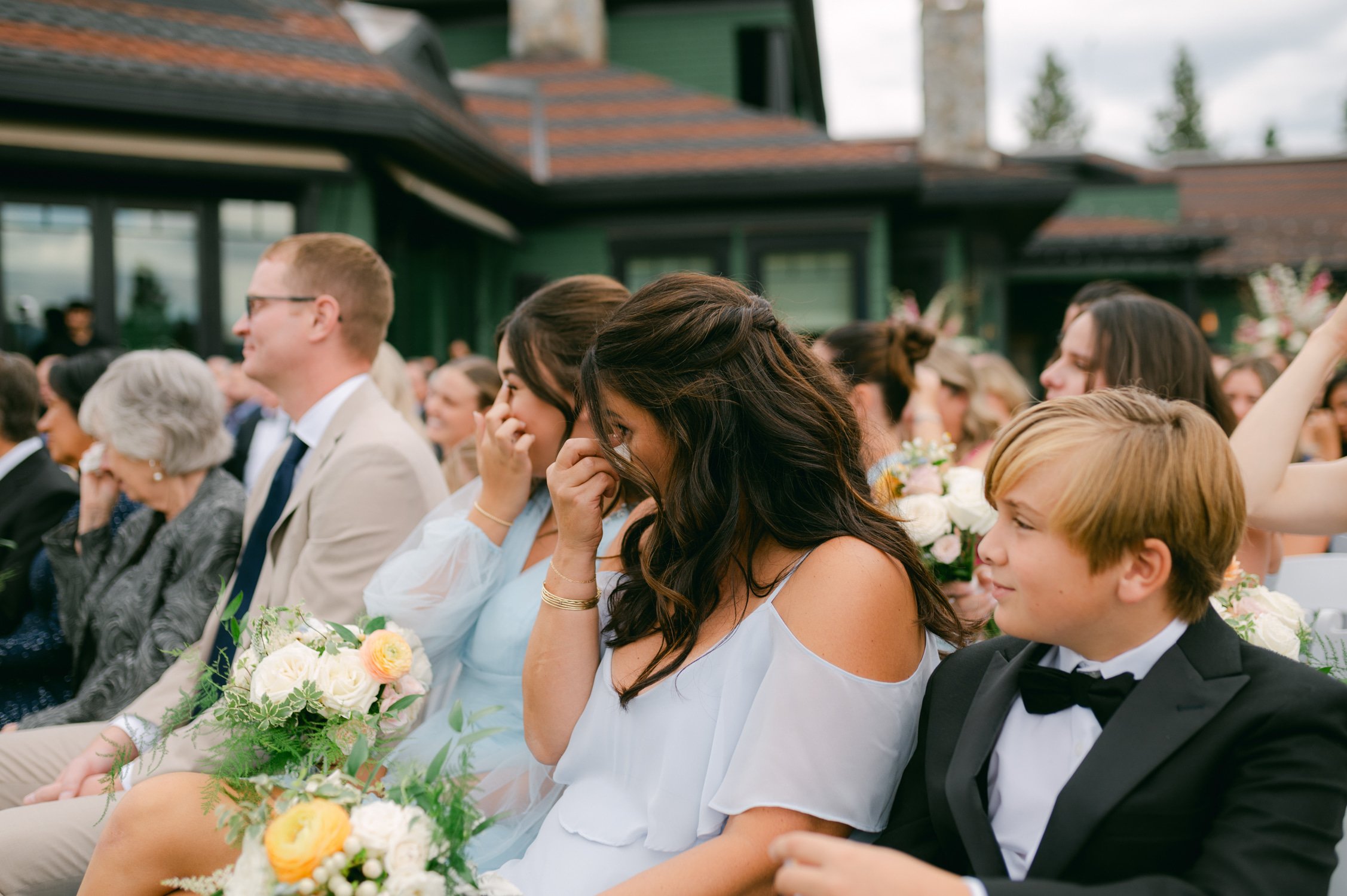 Martis Camp Wedding, photo of the wedding guests being emotional during the vows