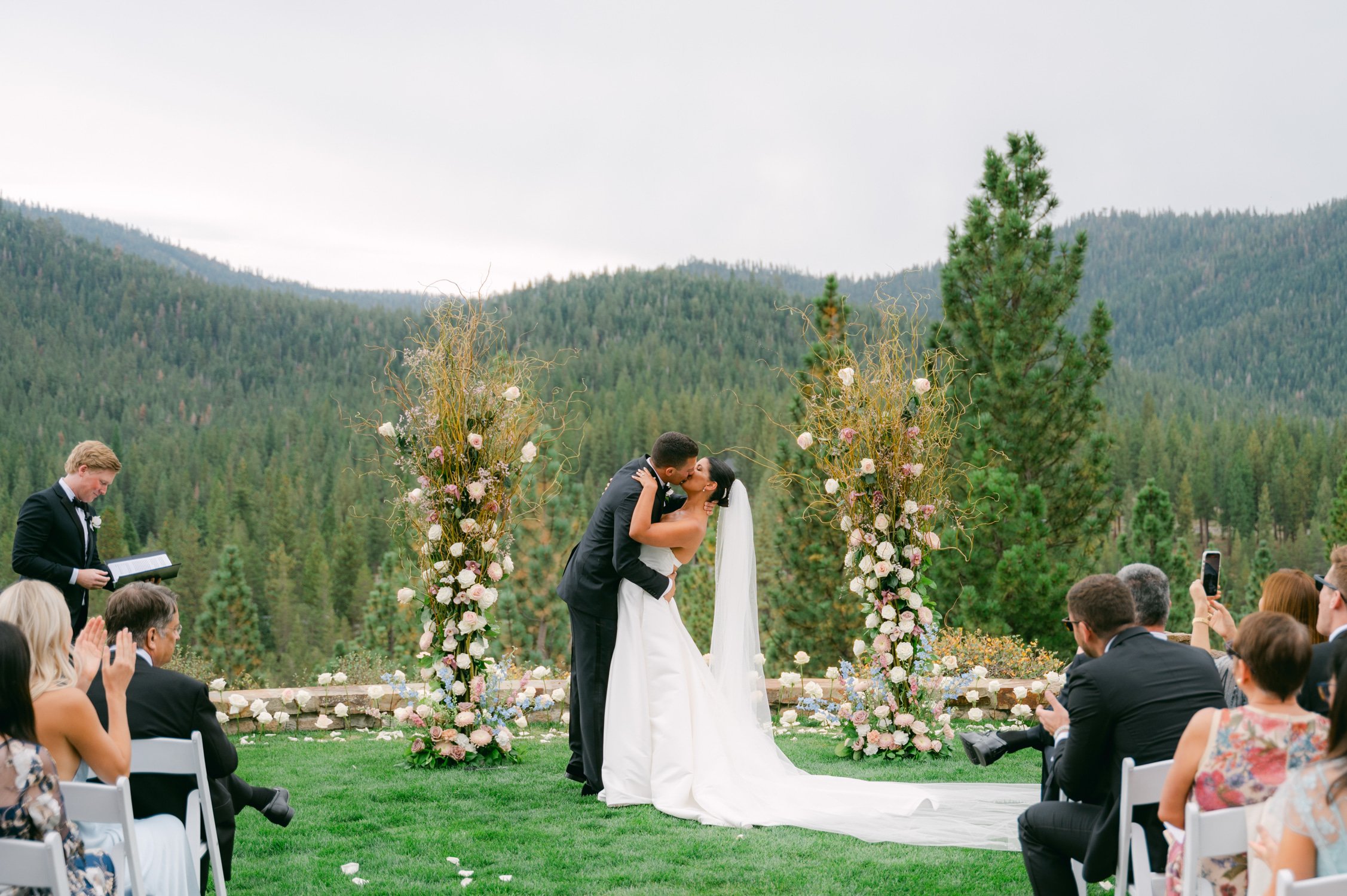Martis Camp Wedding, photo of the newlywed couple’s first kiss at their outdoor wedding ceremony