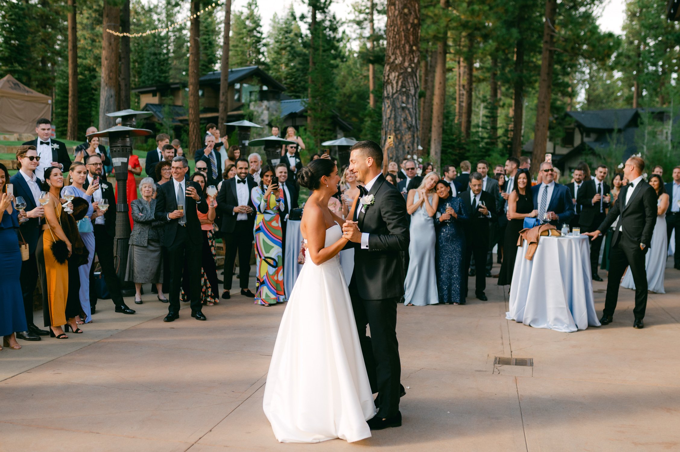 Martis Camp Wedding, photo of the newlywed couple doing their first dance in front of their guests