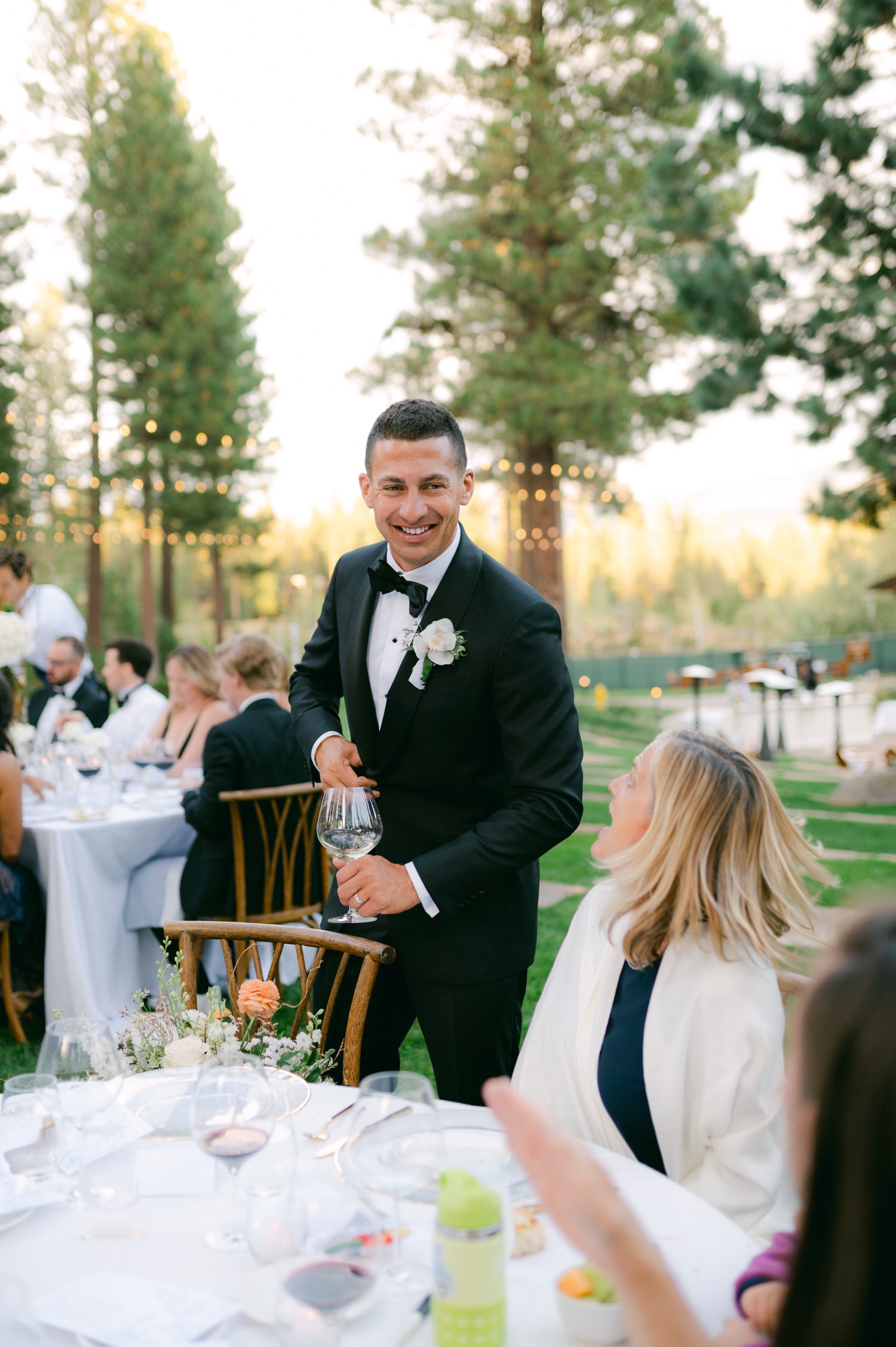 Martis Camp Wedding, photo of the groom talking to their guests