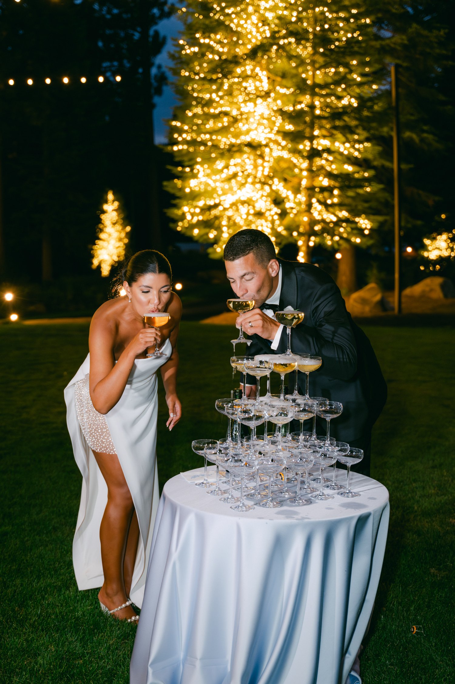 Martis Camp Wedding, photo of the newlywed couple sipping champagne