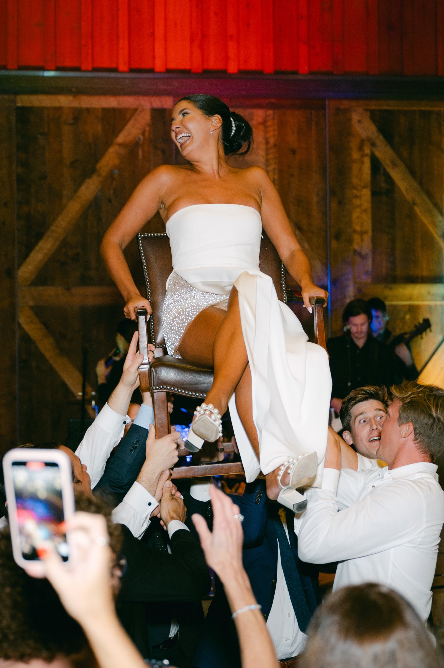 Martis Camp Wedding, photo of the bride carried during the afterparty