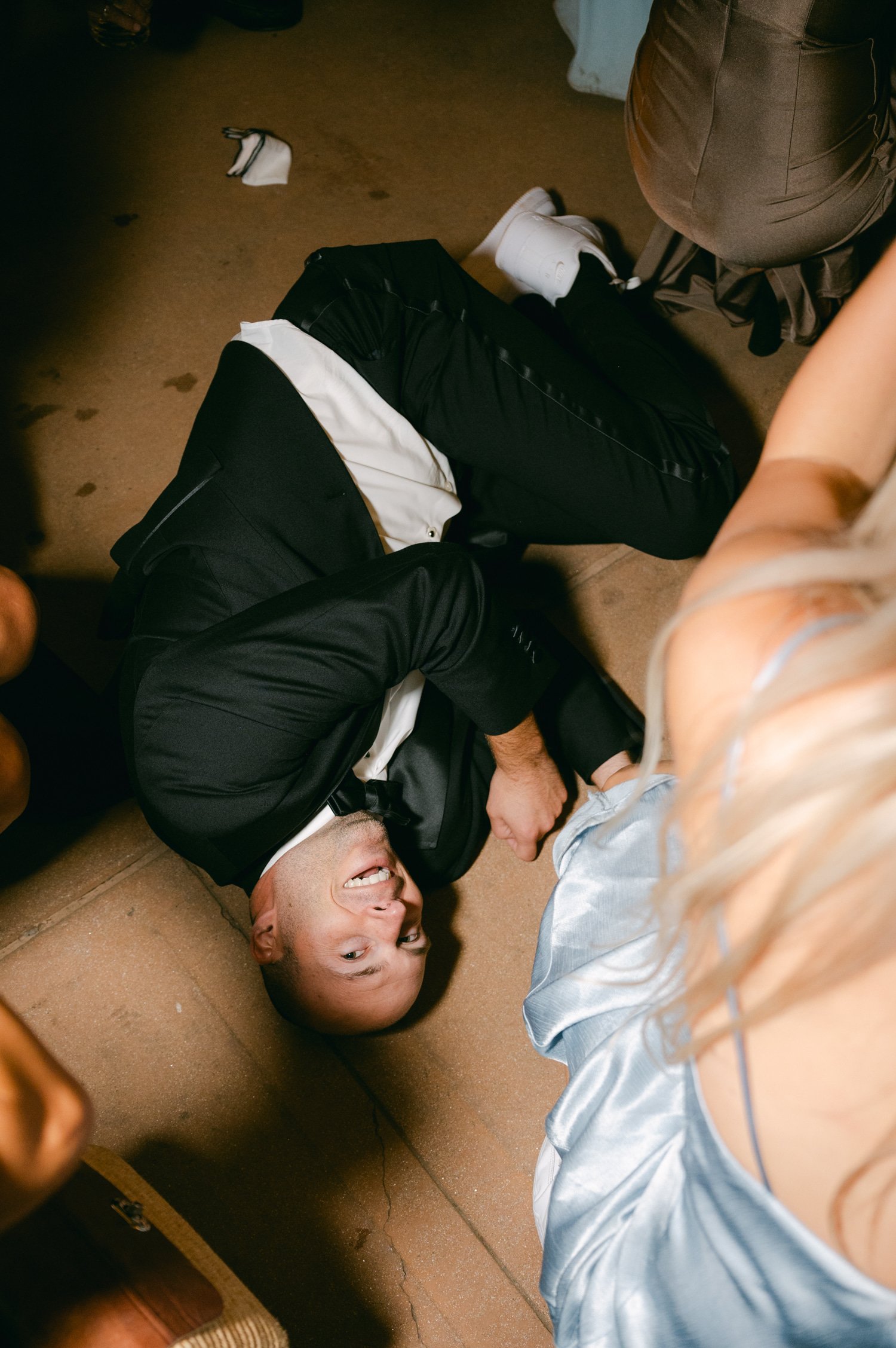 Martis Camp Wedding, photo of the guest down on the floor at the afterparty