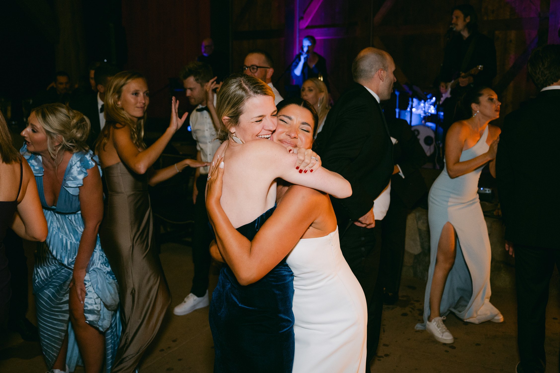 Martis Camp Wedding, photo of the bride hugging the guest at the afterparty
