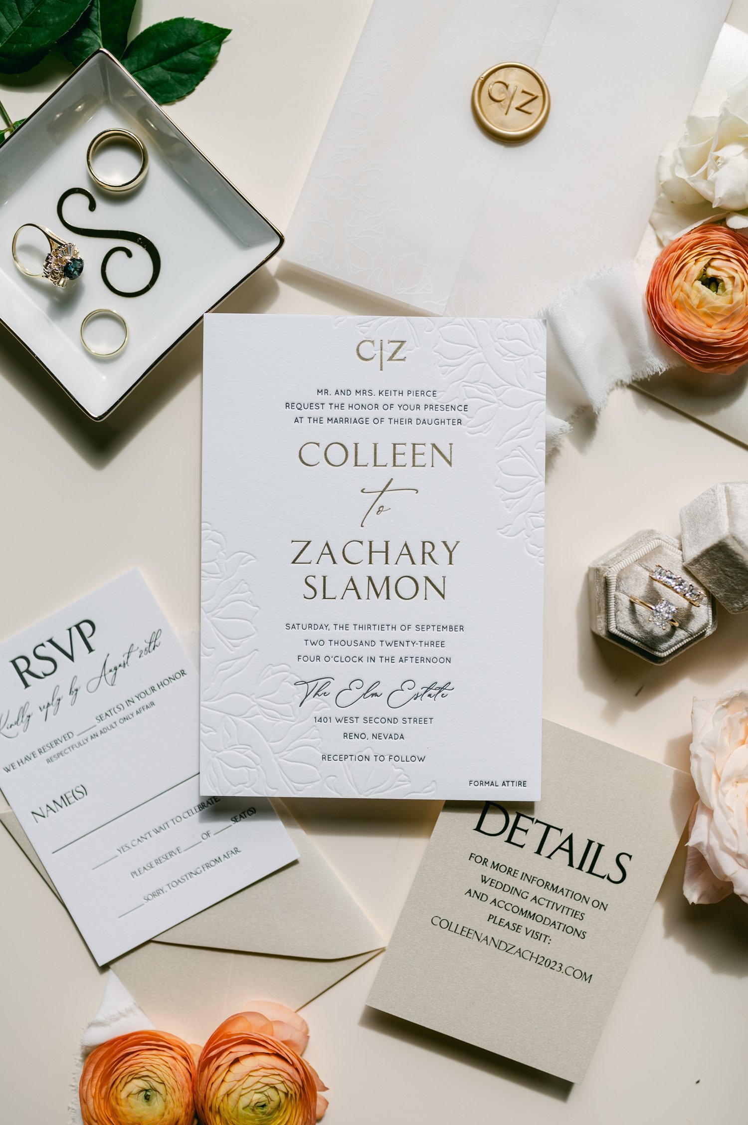 Elm Estate Wedding photos, photo of the wedding invitation with minimalist font on a white background with orange flowers.