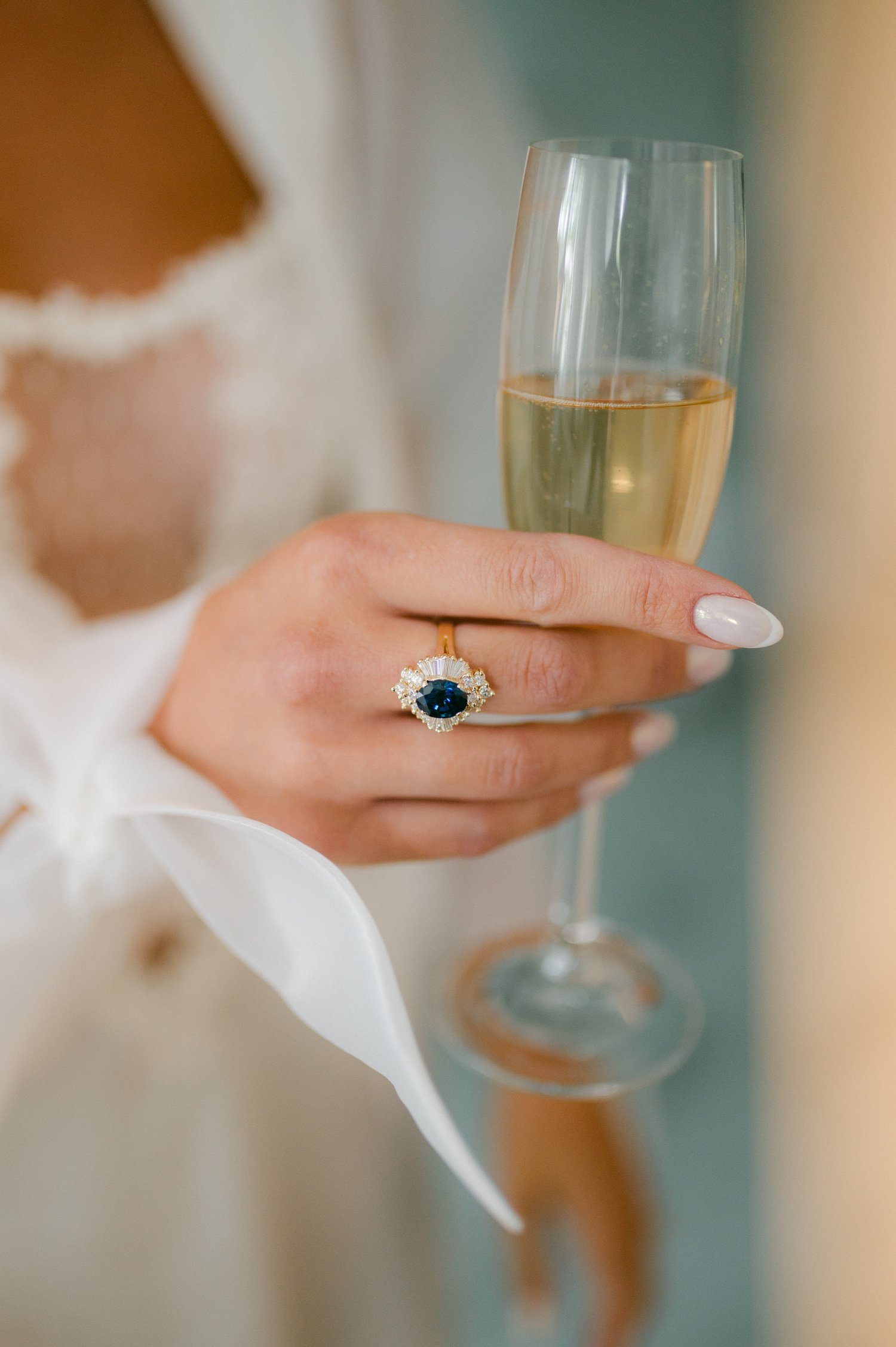 Elm Estate Wedding photos, photo of the bride with one of her wedding day  accessories, a ring with a sapphire and diamond setting  