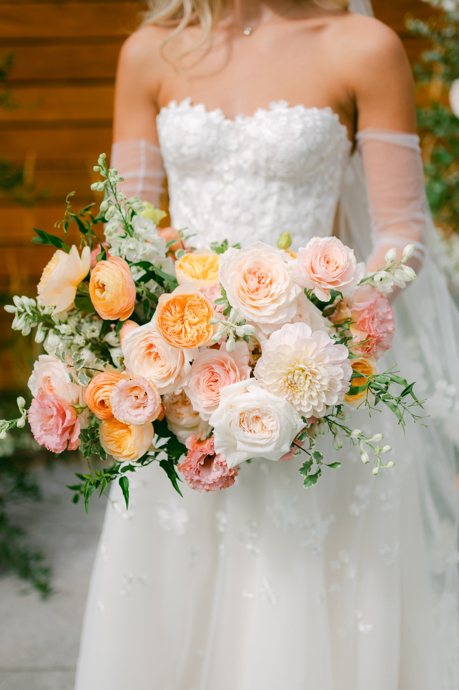 Elm Estate Wedding photos, photo of the bride's soft, romantic wedding bouquet and her elegant lace wedding dress 
