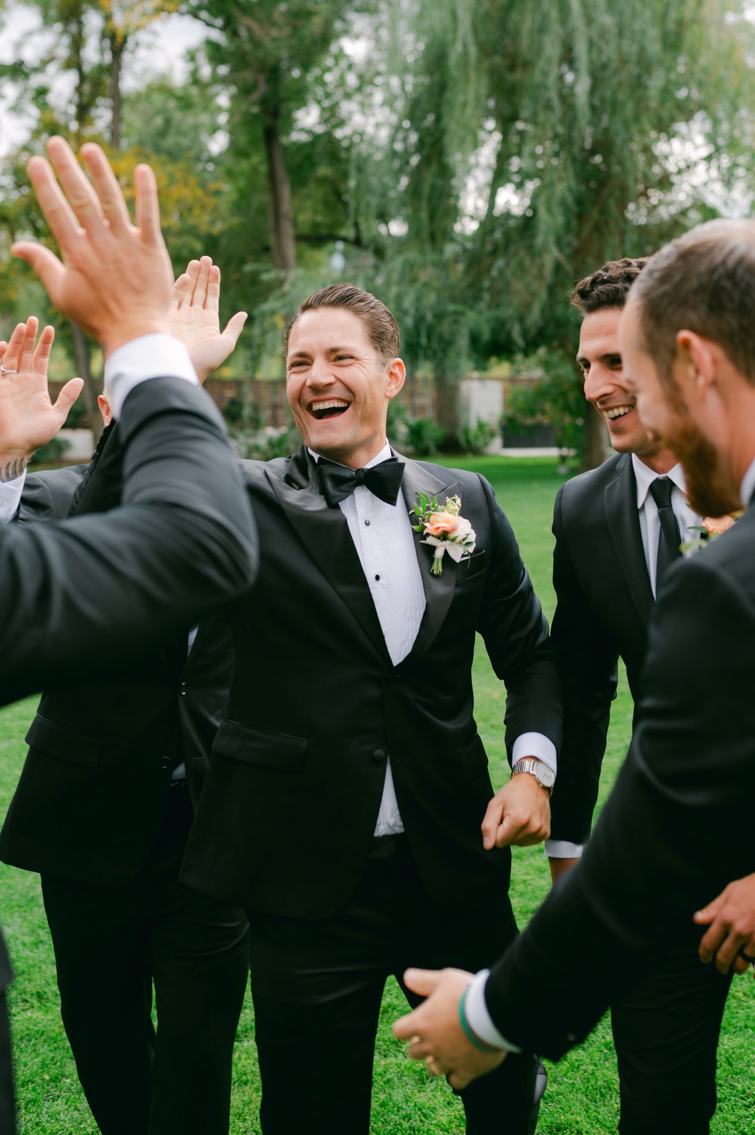 Elm Estate Wedding photos, photo of the groom and groomsmen enjoying each other's company before the ceremony