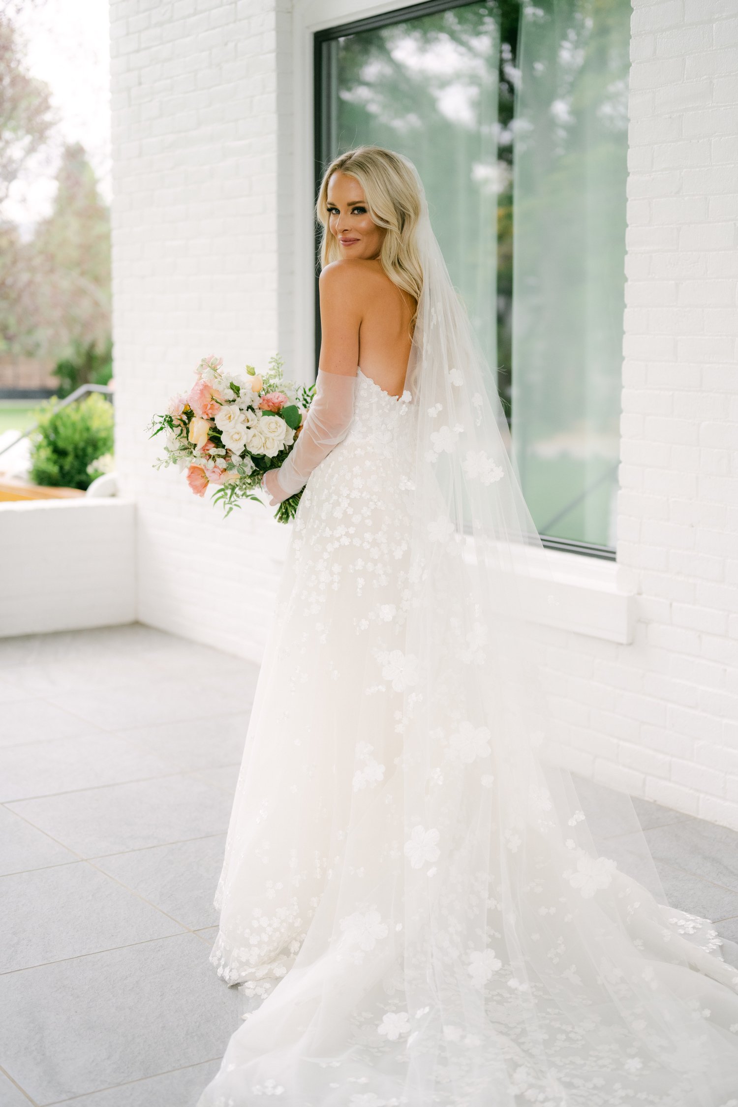 Elm Estate Wedding photos, photo of the bride in her ethereal wedding dress with delicate flower details