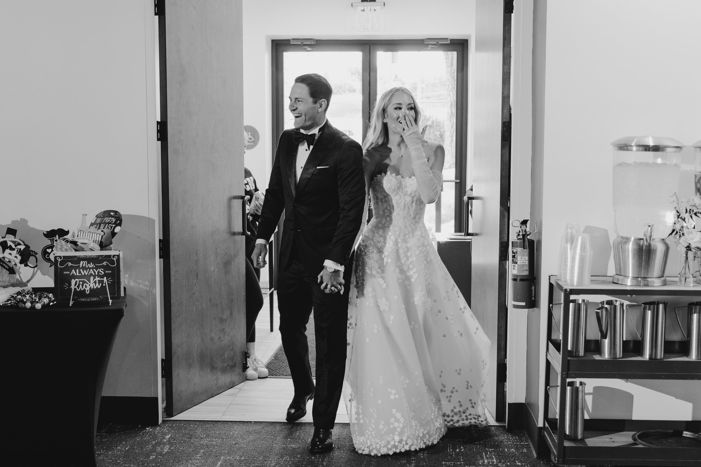 Elm Estate Wedding photos, photo of the newlywed couple entering their wedding reception