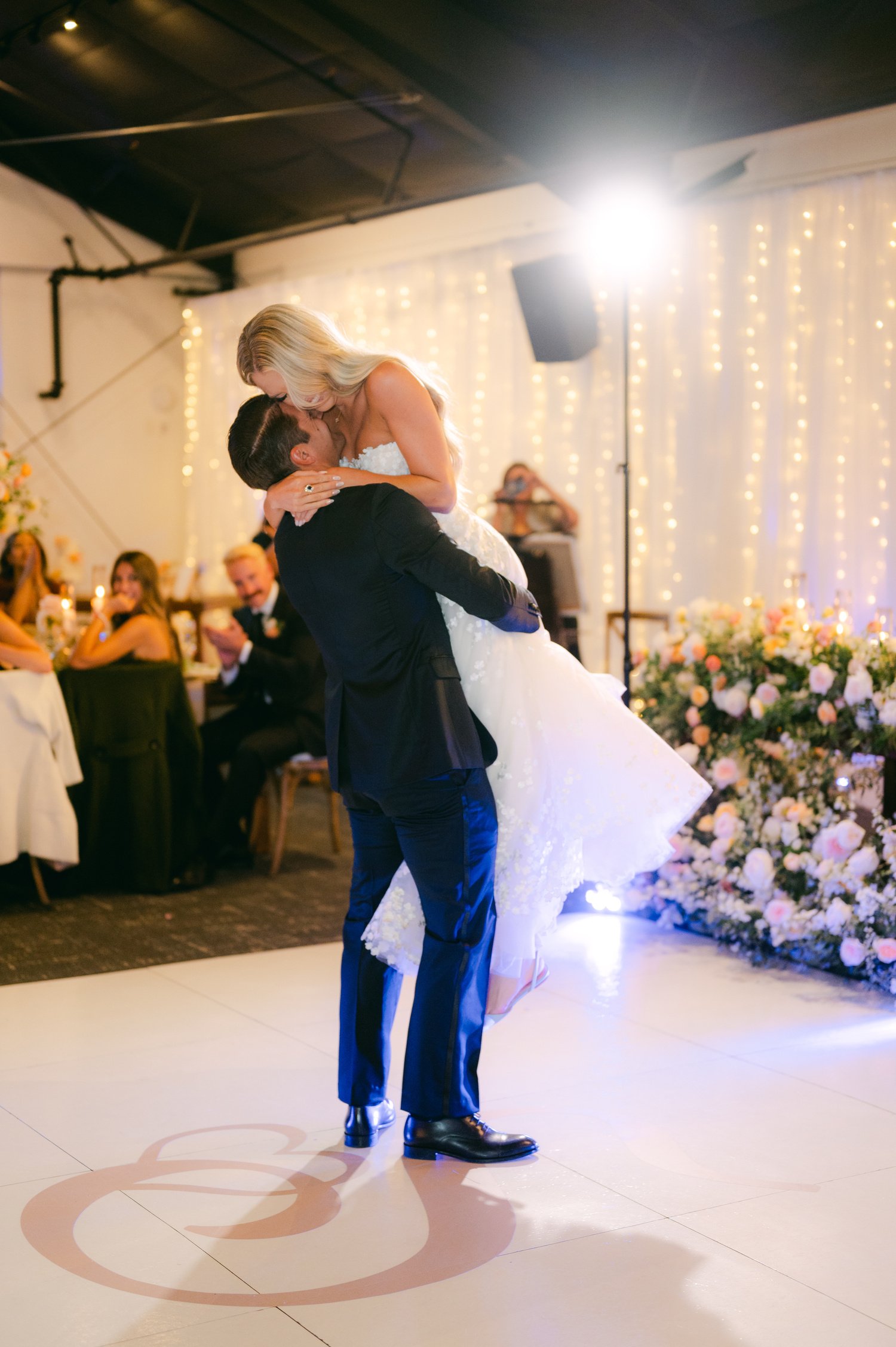 Elm Estate Wedding photos, photo of the groom carrying the bride during their first dance