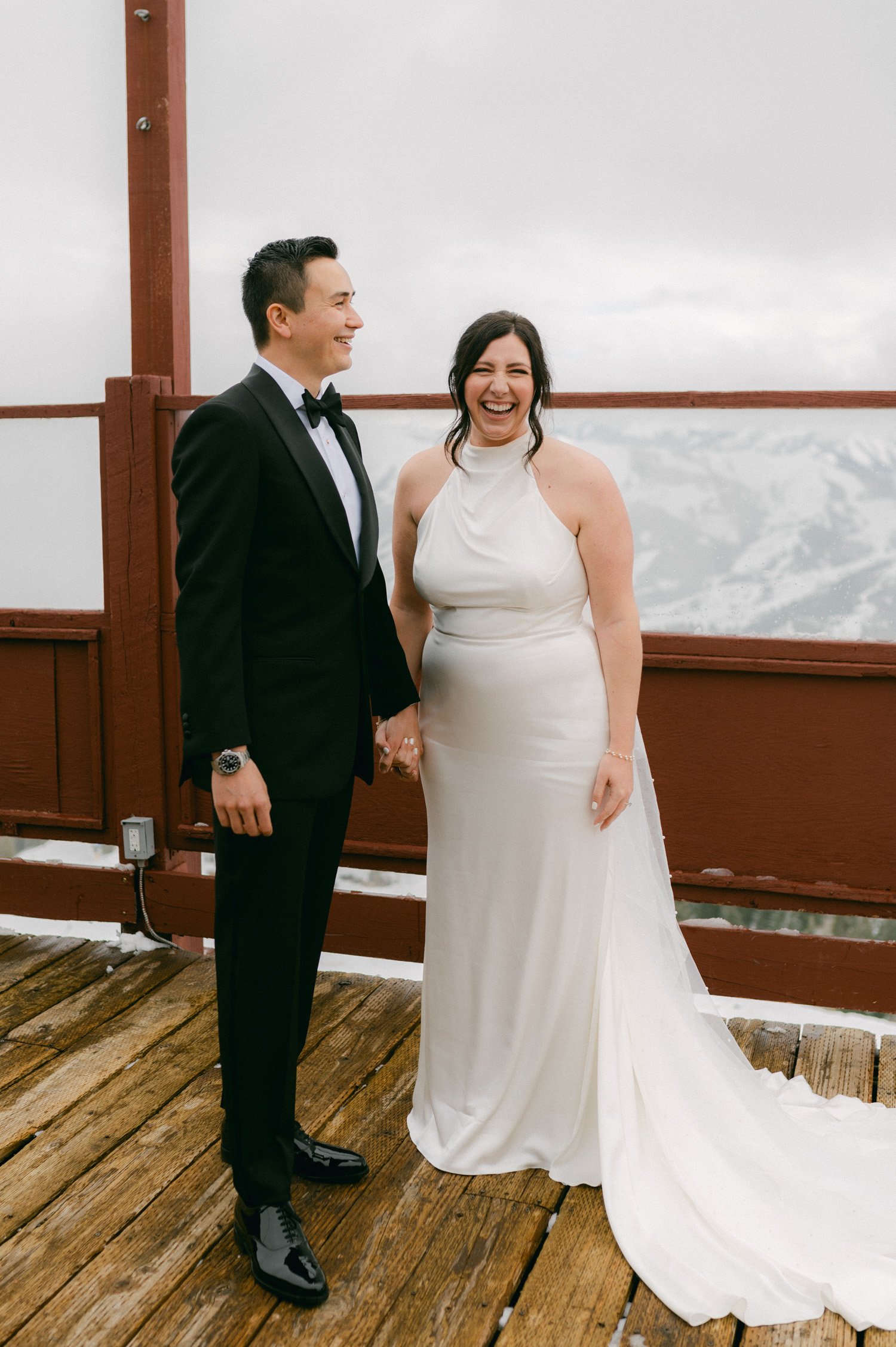 Sun Valley Roundhouse Wedding photos of the couple holding hands and being happy during their first look