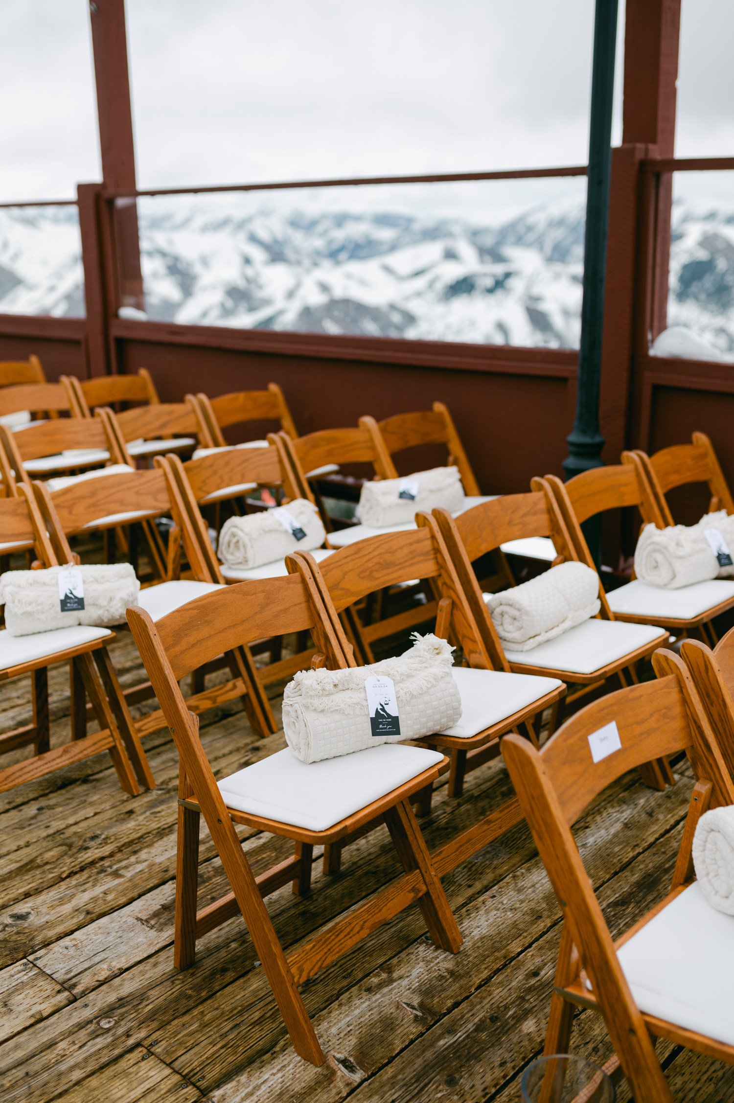 Sun Valley Roundhouse Wedding photos of the wooden chairs with blanket provided for their guests