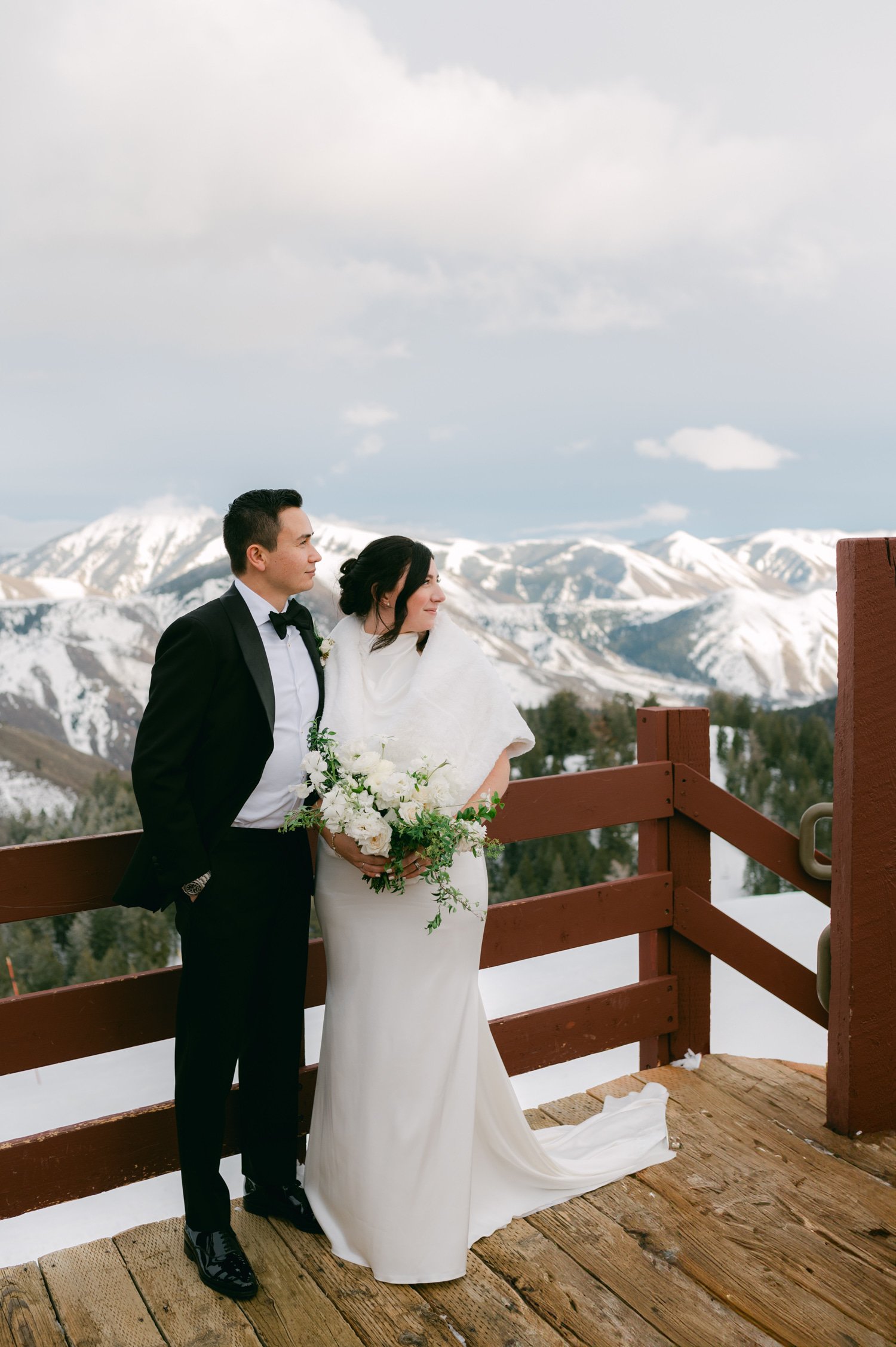 Sun Valley Roundhouse Wedding photo of the newlywed couple with mountains in the background