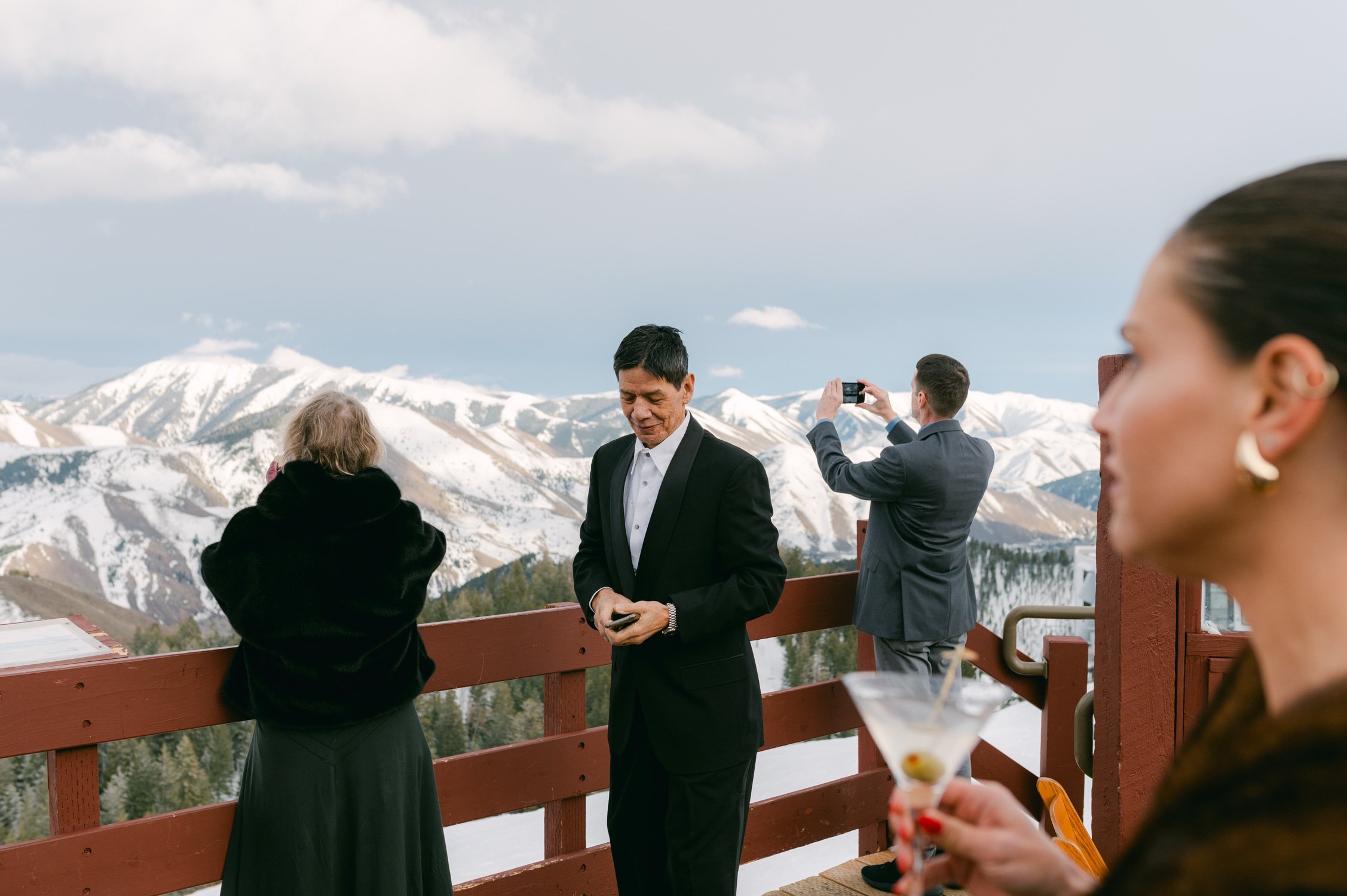 Sun Valley Roundhouse Wedding photo of the wedding guests taking photos of the picturesque view