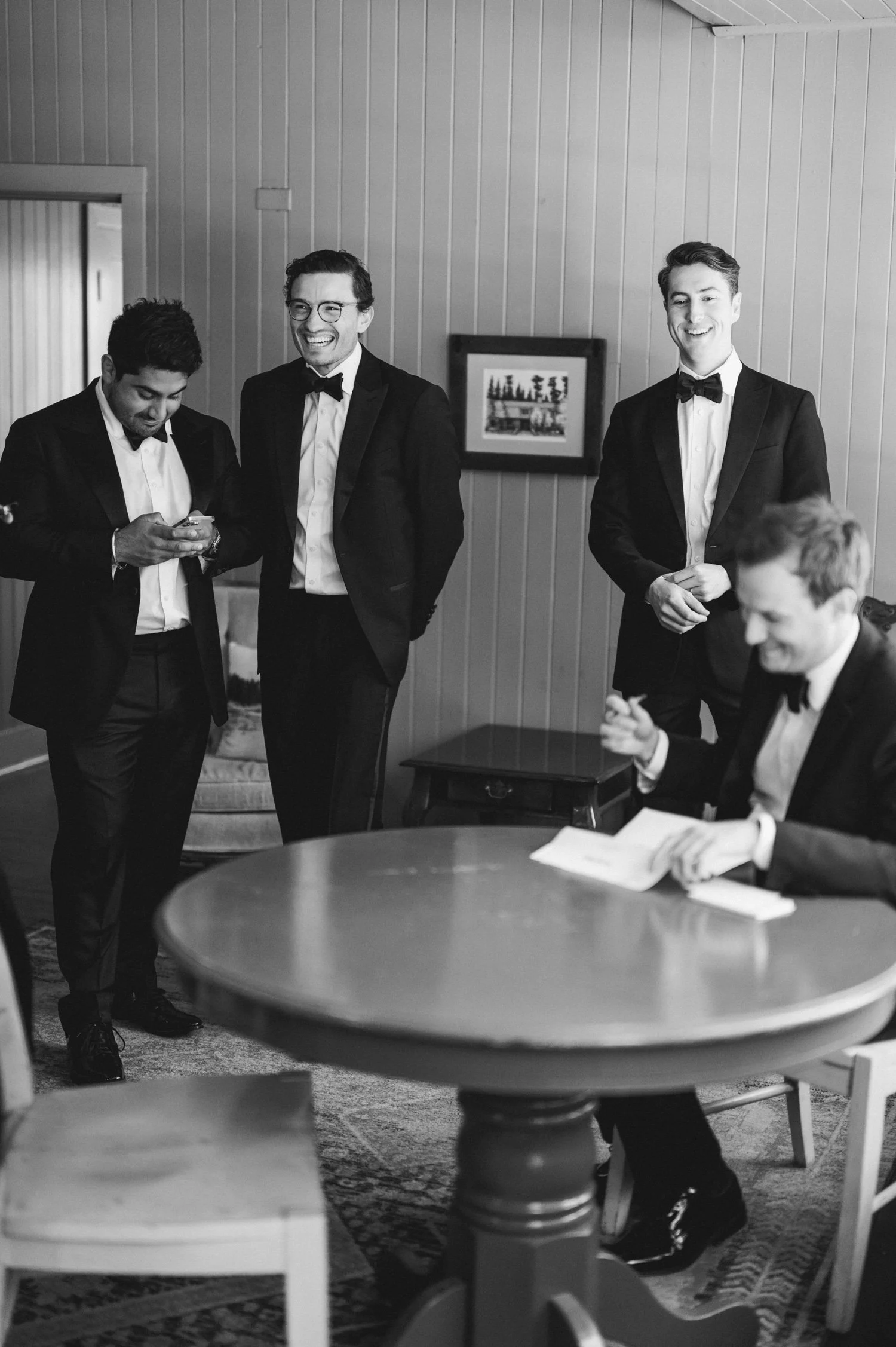 Valhalla wedding photo of the groom and groomsmen preparing together