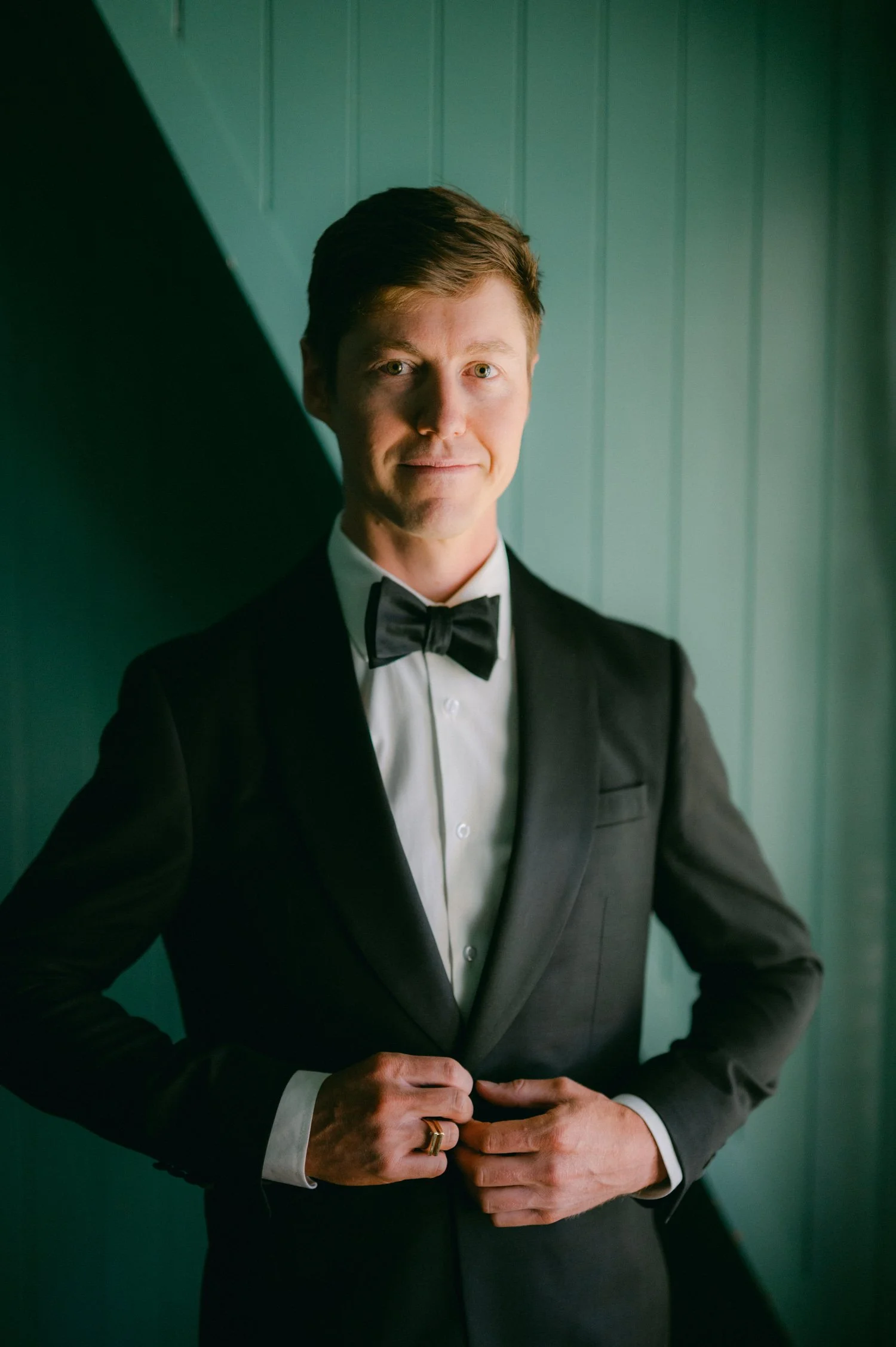 Valhalla wedding photo of the groom in a black classic tuxedo