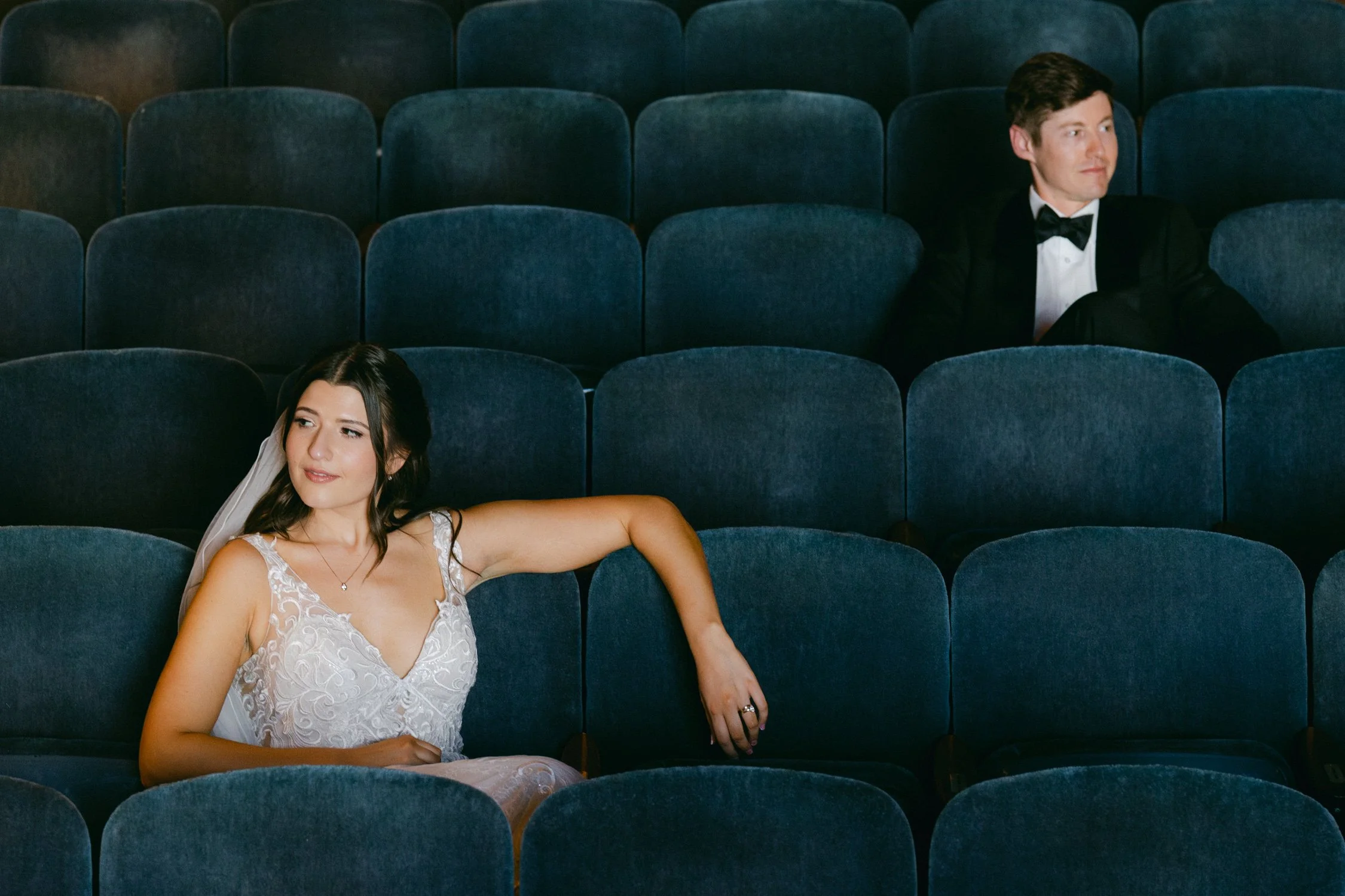 Valhalla wedding photo of the bride and groom inside a theater
