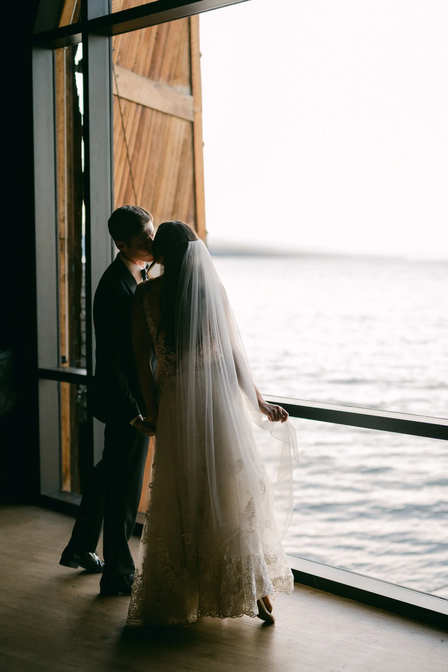 Valhalla wedding photo of the couple silhouetted by the lake