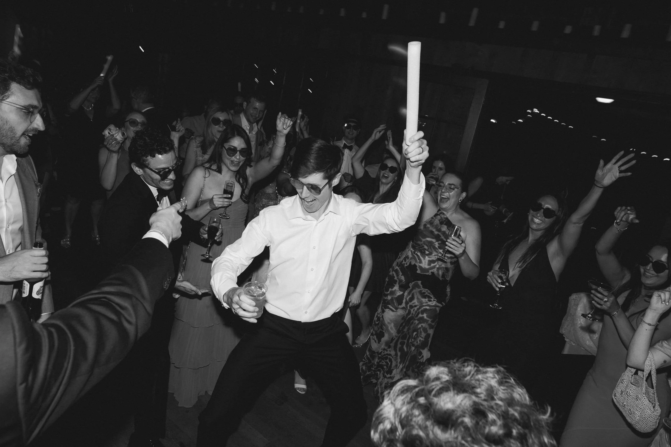 Valhalla wedding photo of the groom dancing with guests