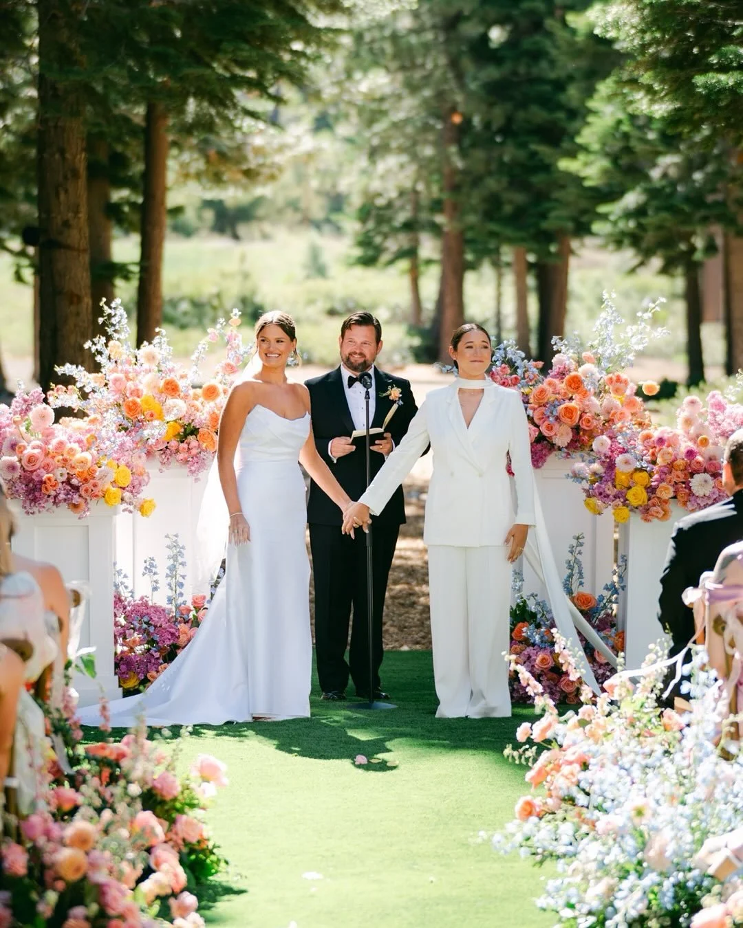 Cat and Hannah Marie&rsquo;s wedding was painted in pink. The pink hues shifted with the day&hellip;the afternoon forest light made for a dreamy soft pink tones for the ceremony, then bold and punchy tones under the moody reception lights. By the tim