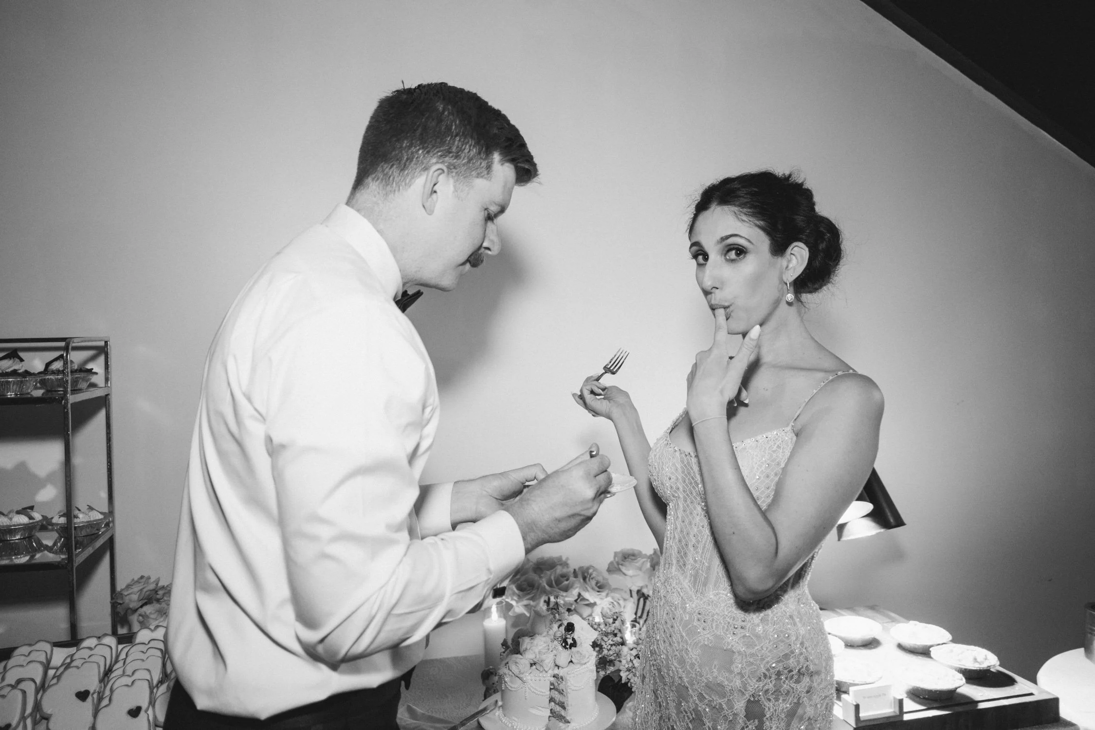 Edgewood Lake Tahoe wedding, photo of the bride and groom enjoying their wedding cake