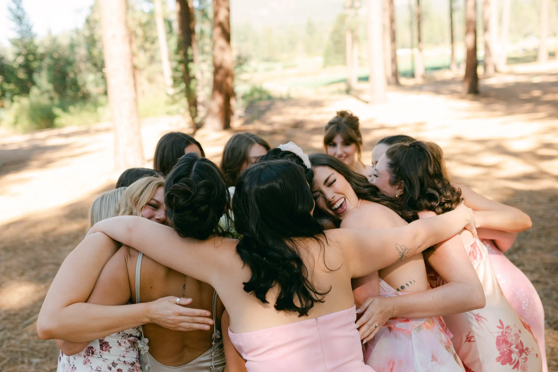 Edgewood Lake Tahoe wedding, photo of bridesmaids embracing the bride before the ceremony