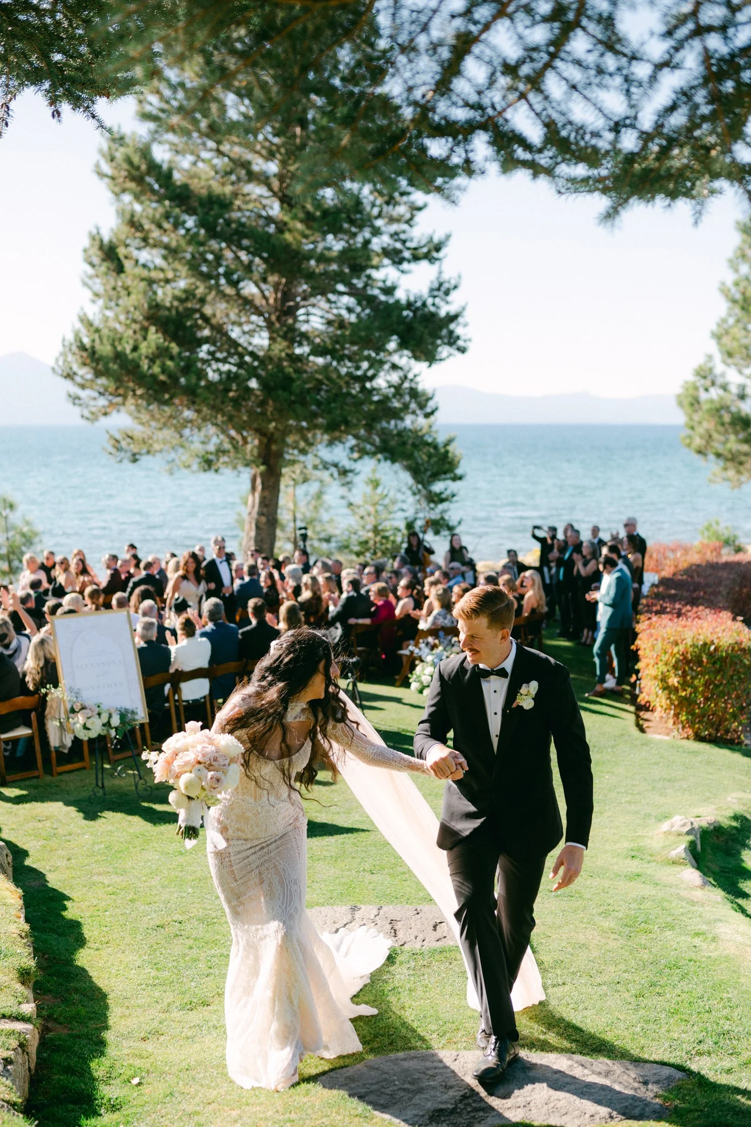 Edgewood Lake Tahoe wedding, photo of the bride and groom joyfully walking after their ceremony