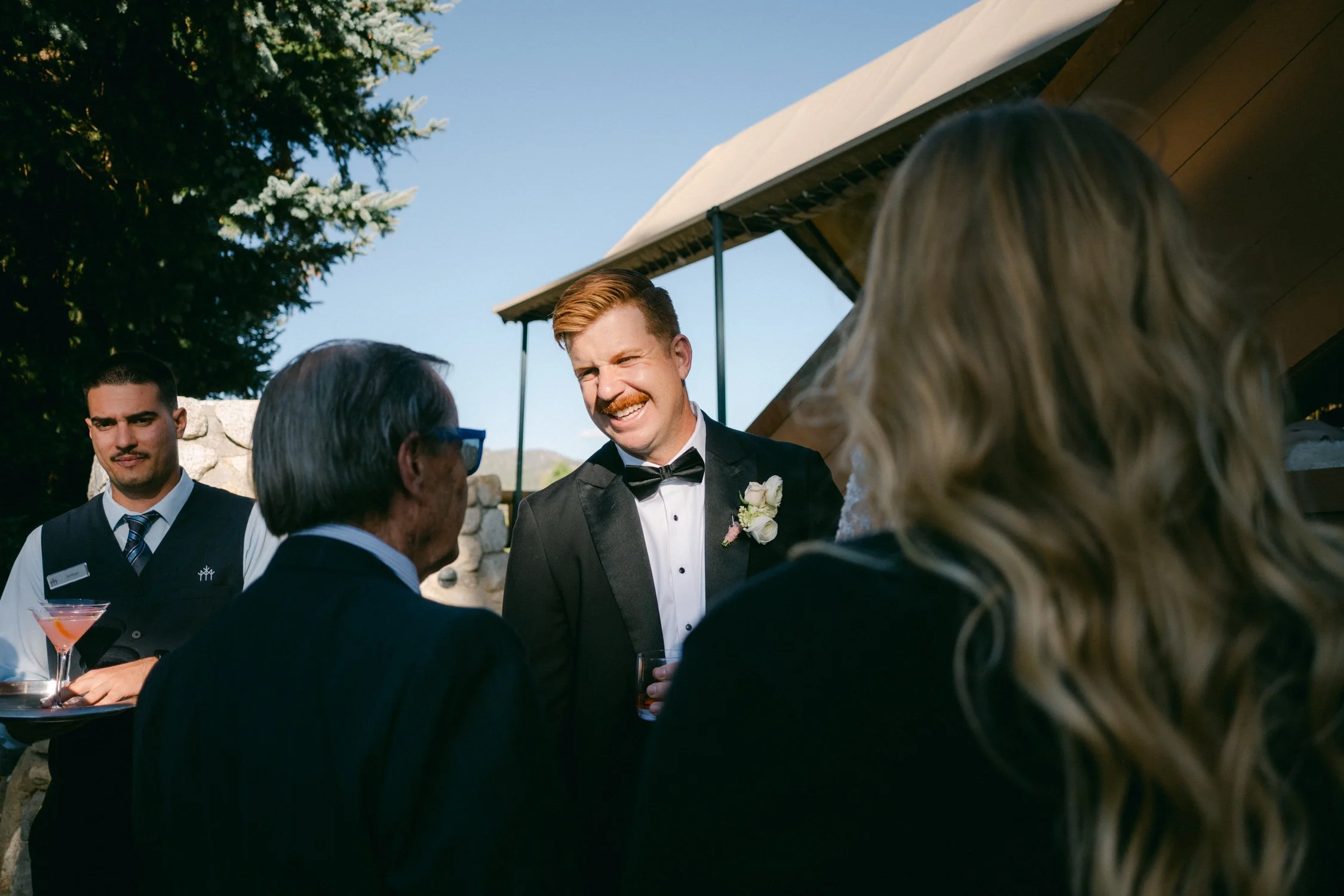 Edgewood Lake Tahoe wedding, photo of the groom mingling with guests during cocktail hour