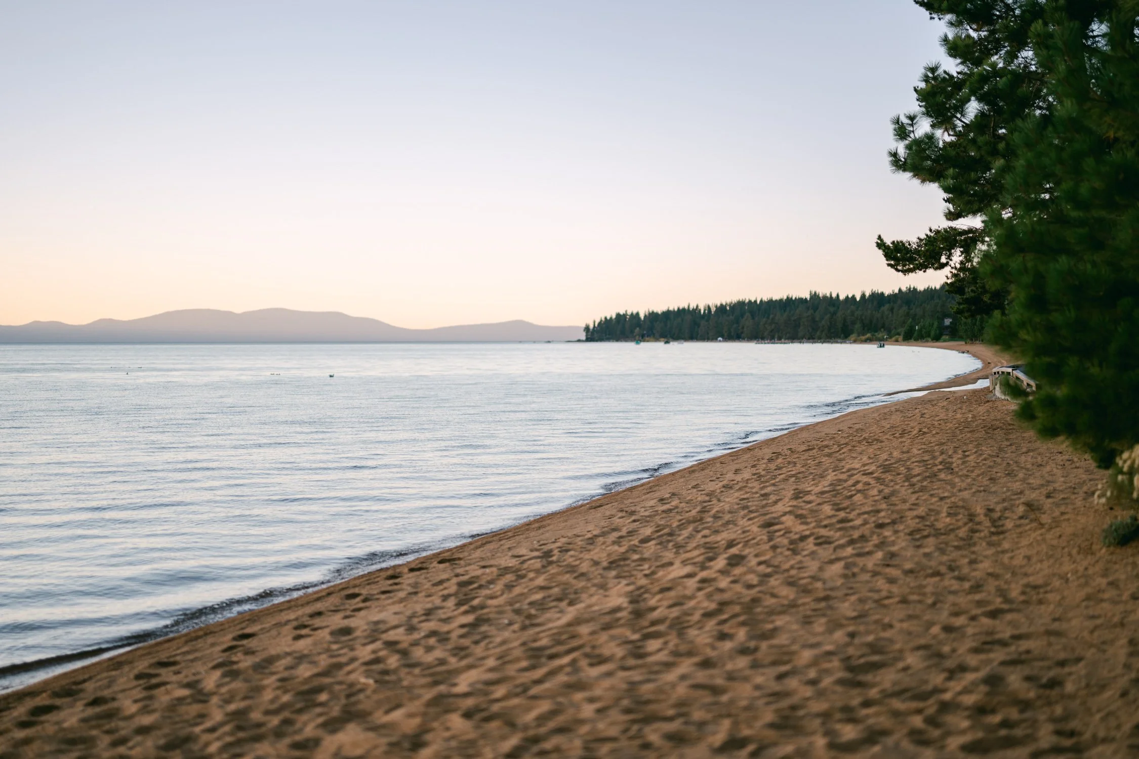 Edgewood Lake Tahoe wedding, photo of the serene lakeside at sunset
