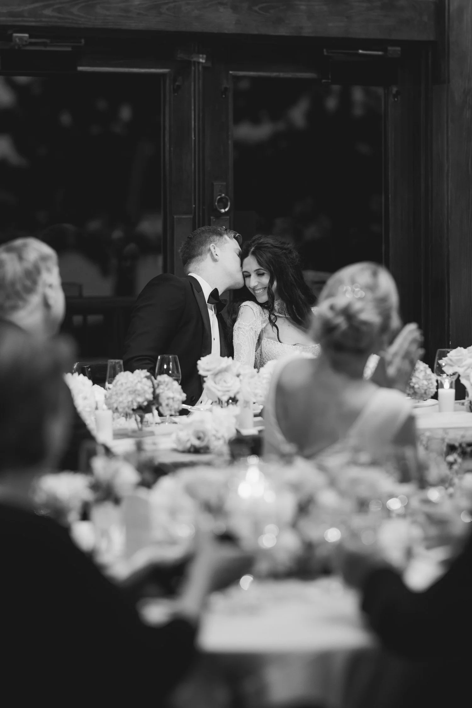 Edgewood Lake Tahoe wedding, photo of the groom kissing the bride during speeches