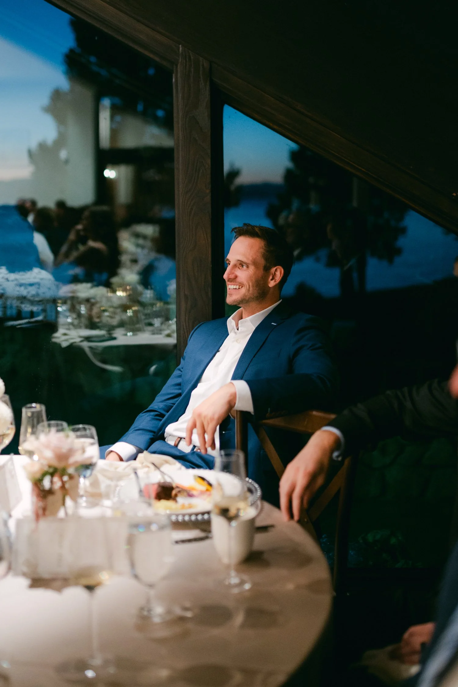 Edgewood Lake Tahoe wedding, photo of guests laughing and enjoying the heartfelt speeches