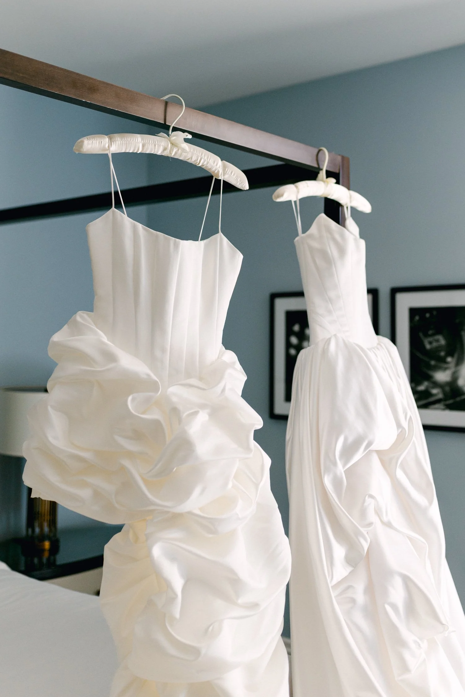 California Academy of Sciences in San Francisco Wedding, photo of two corset wedding dresses hanging beautifully 