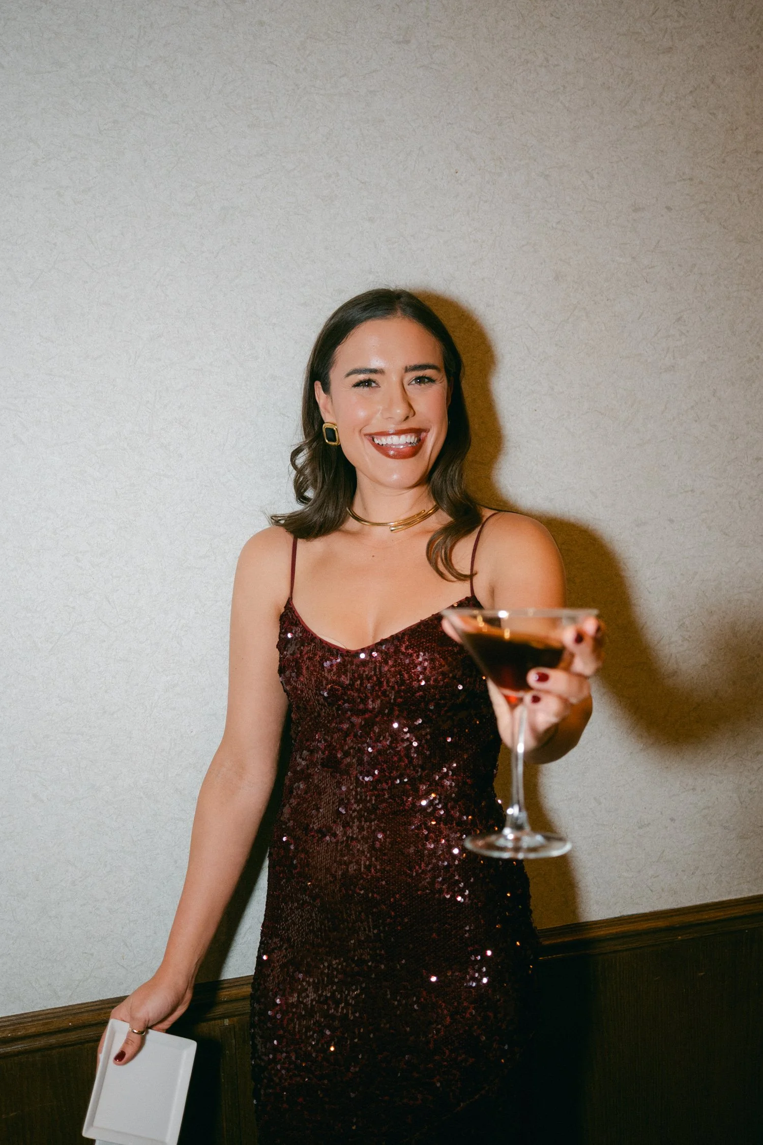 PlumpJack Wedding, photo of a wedding guest in a sparkly dress during cocktail hour 