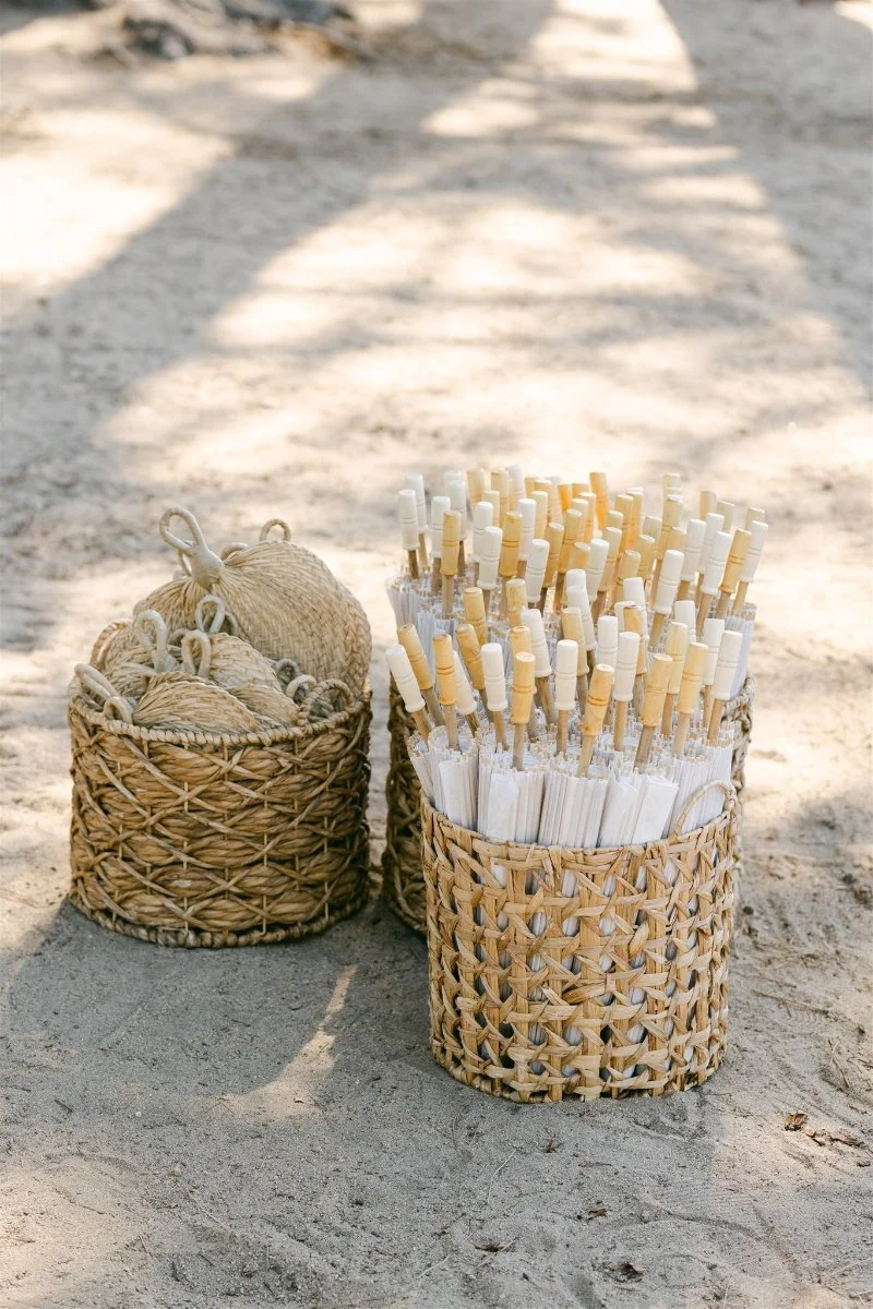 Beach Retreat &amp; Lodge at Tahoe wedding, photo of parasol umbrellas prepared for the outdoor beach ceremony