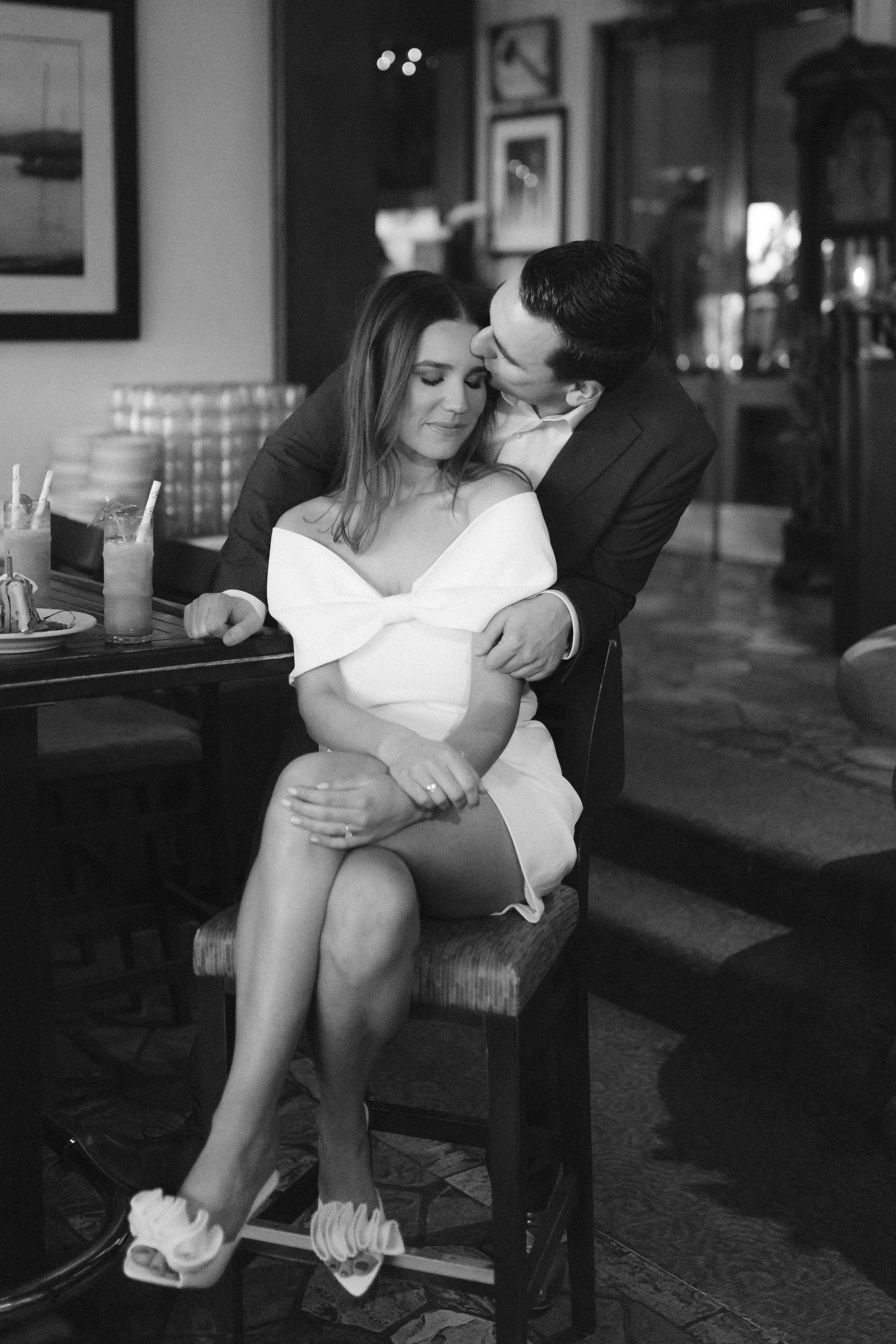 Lake Tahoe Engagement session, photo of the couple sharing an intimate moment inside Gar Woods