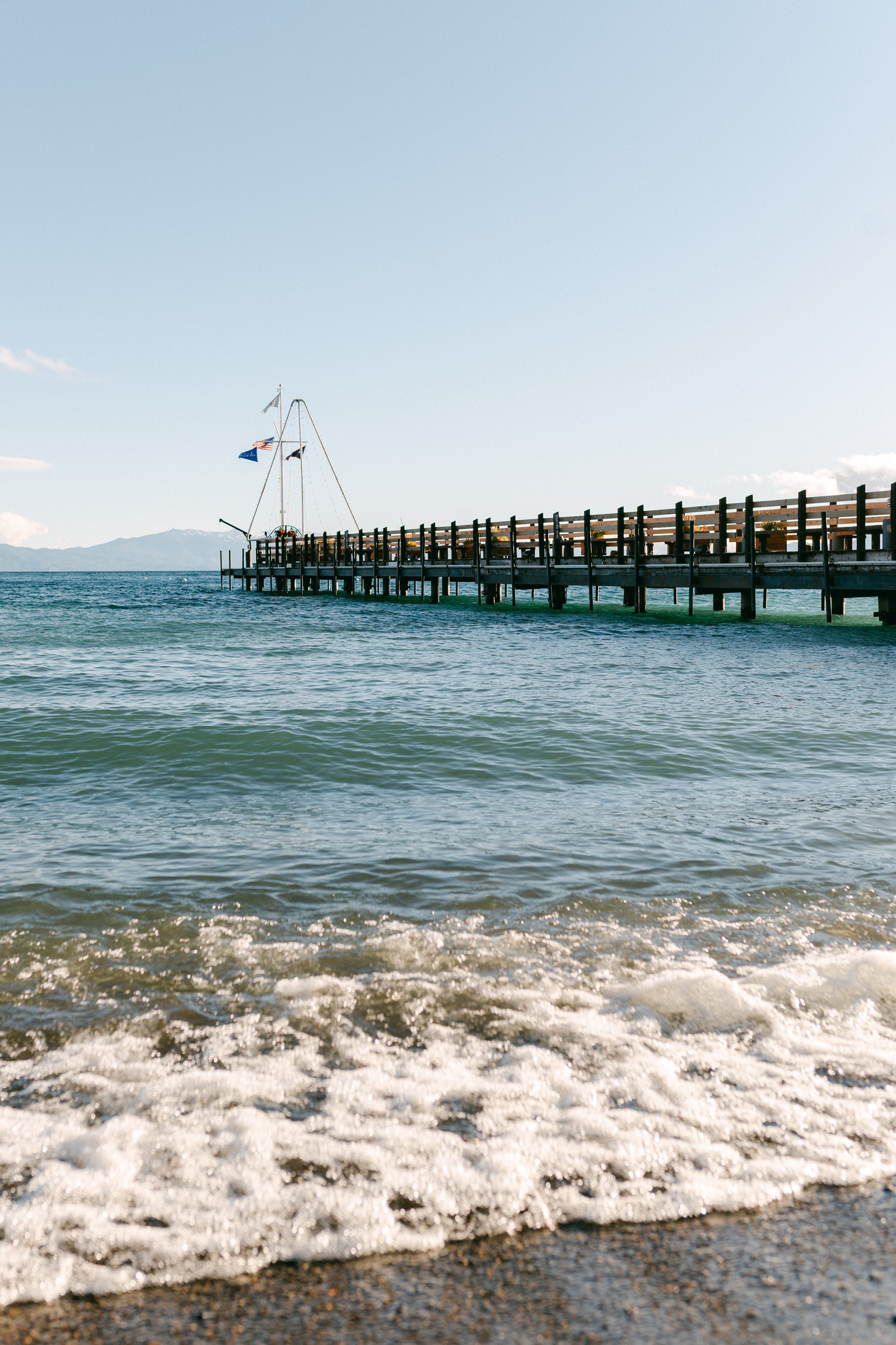 Lake Tahoe Engagement session, photo of a serene moment at Gar Woods Grill &amp; Pier overlooking Lake Tahoe, California