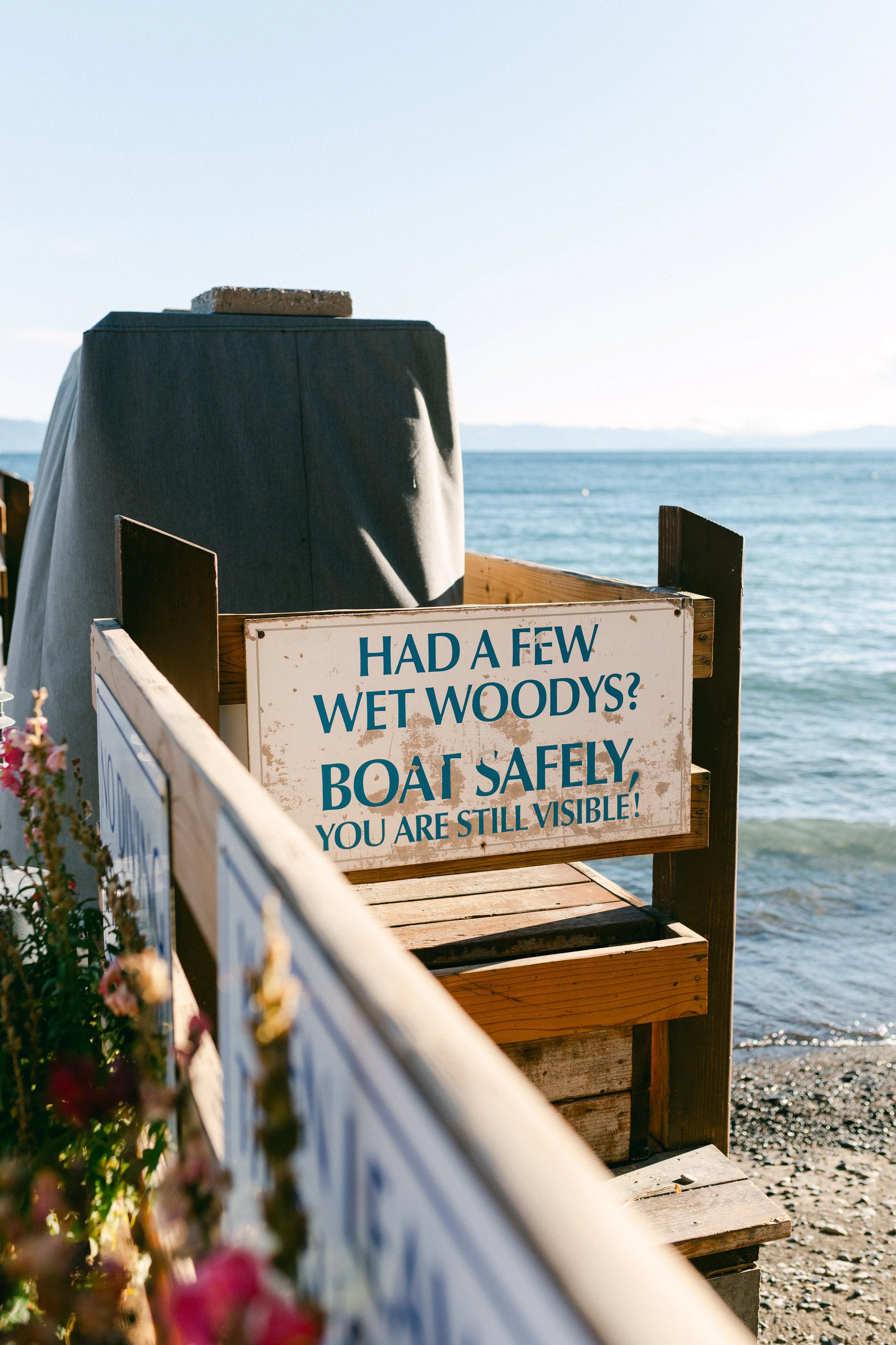 Lake Tahoe Engagement session, photo of a charming waterfront restaurant sign near the lakeside