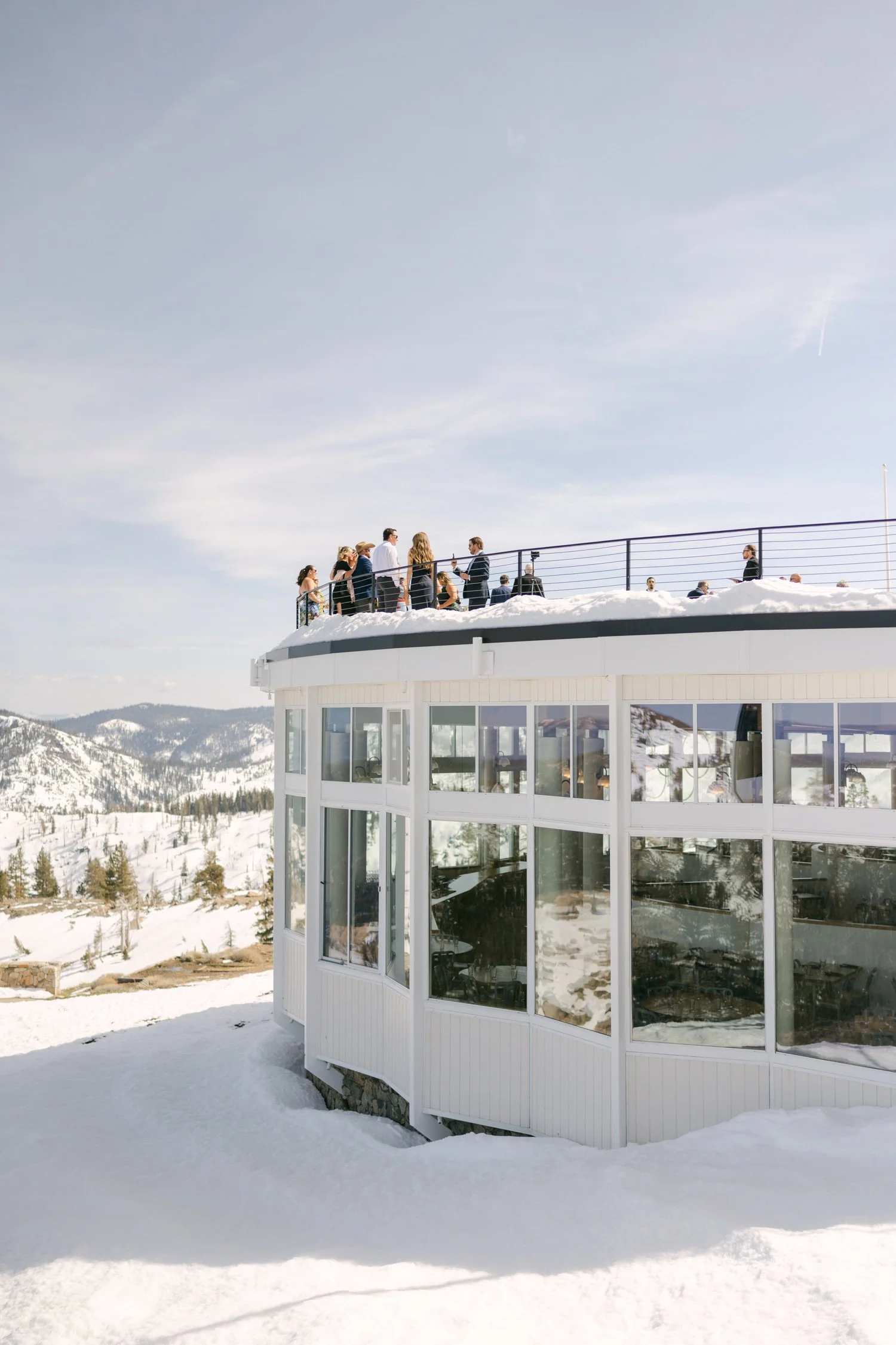 Palisades wedding venue, photo of a wedding celebration taking place on the terrace of High Camp at Palisades Tahoe. 