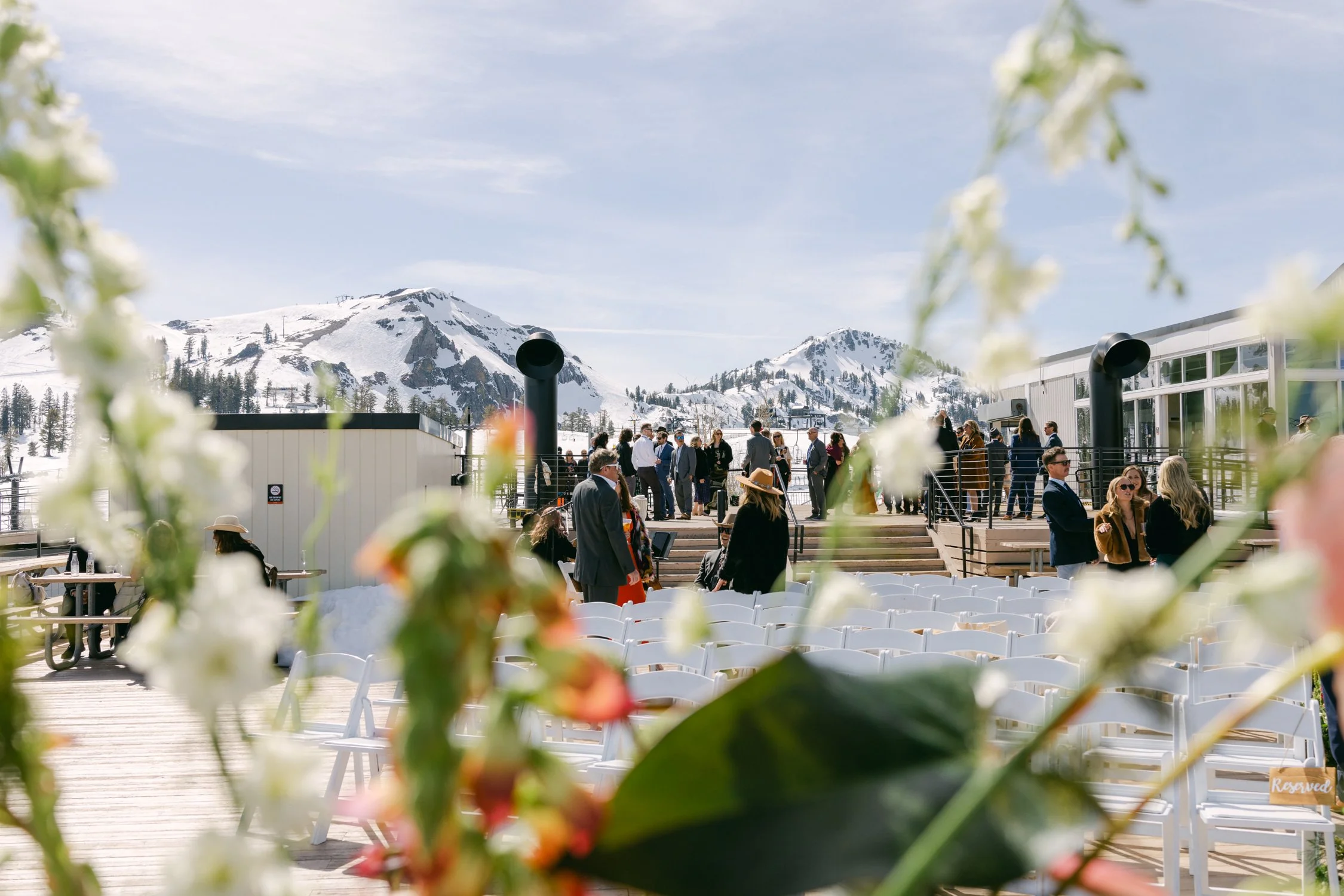 High Camp Ceremony, photo of the wedding ceremony venue featuring panoramic views of snowy Sierra Nevada mountain