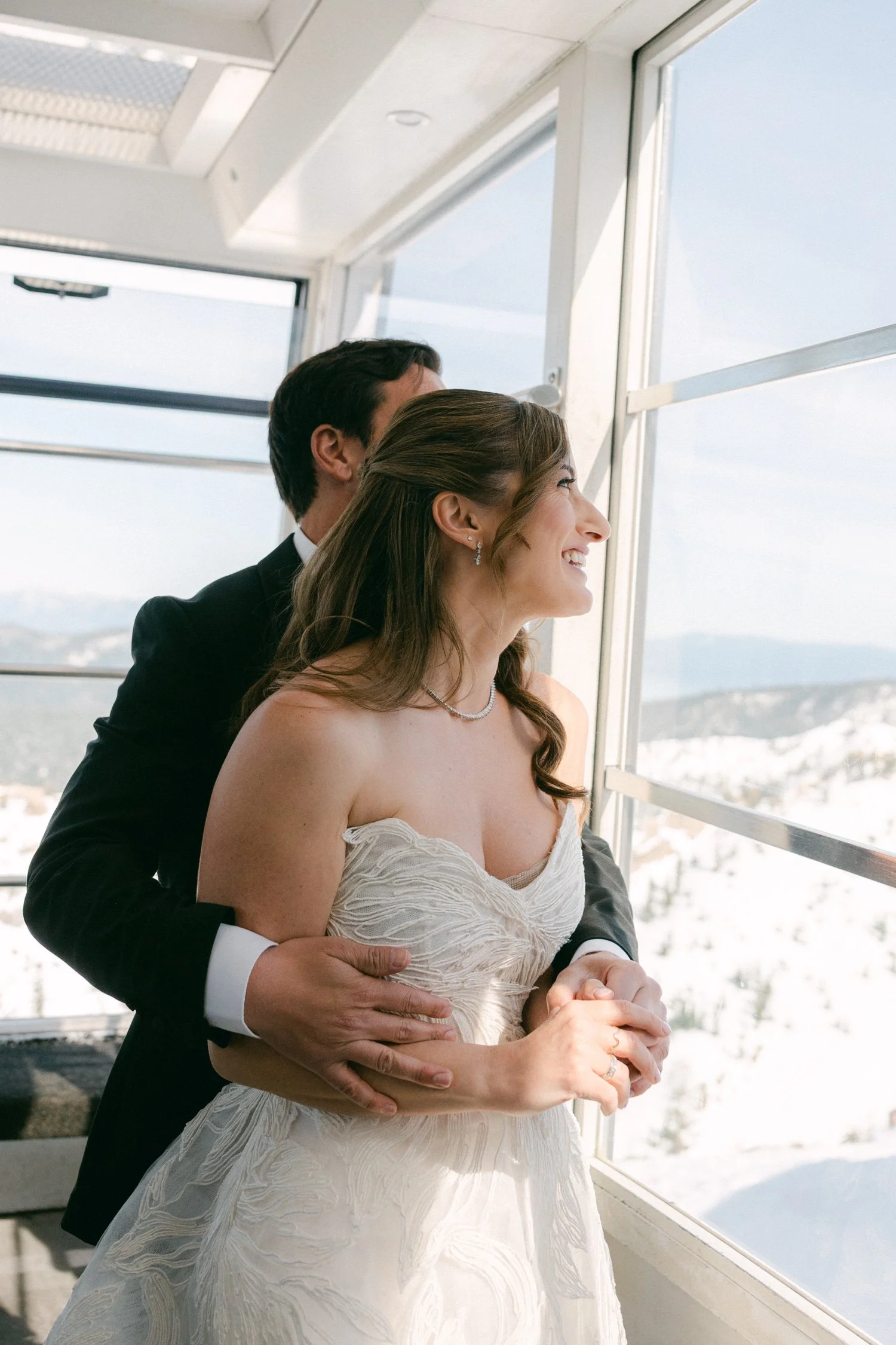 Palisades wedding venue, photo of the bride and groom inside a gondola for their mountain resort wedding