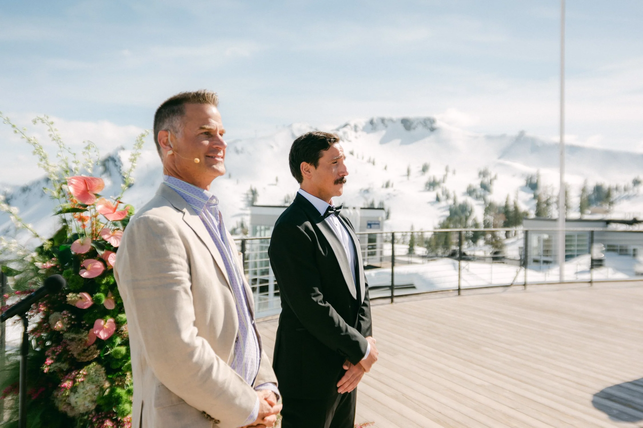 High Camp Ceremony, photo of a wedding ceremony on a deck overlooking snowy mountains. 
