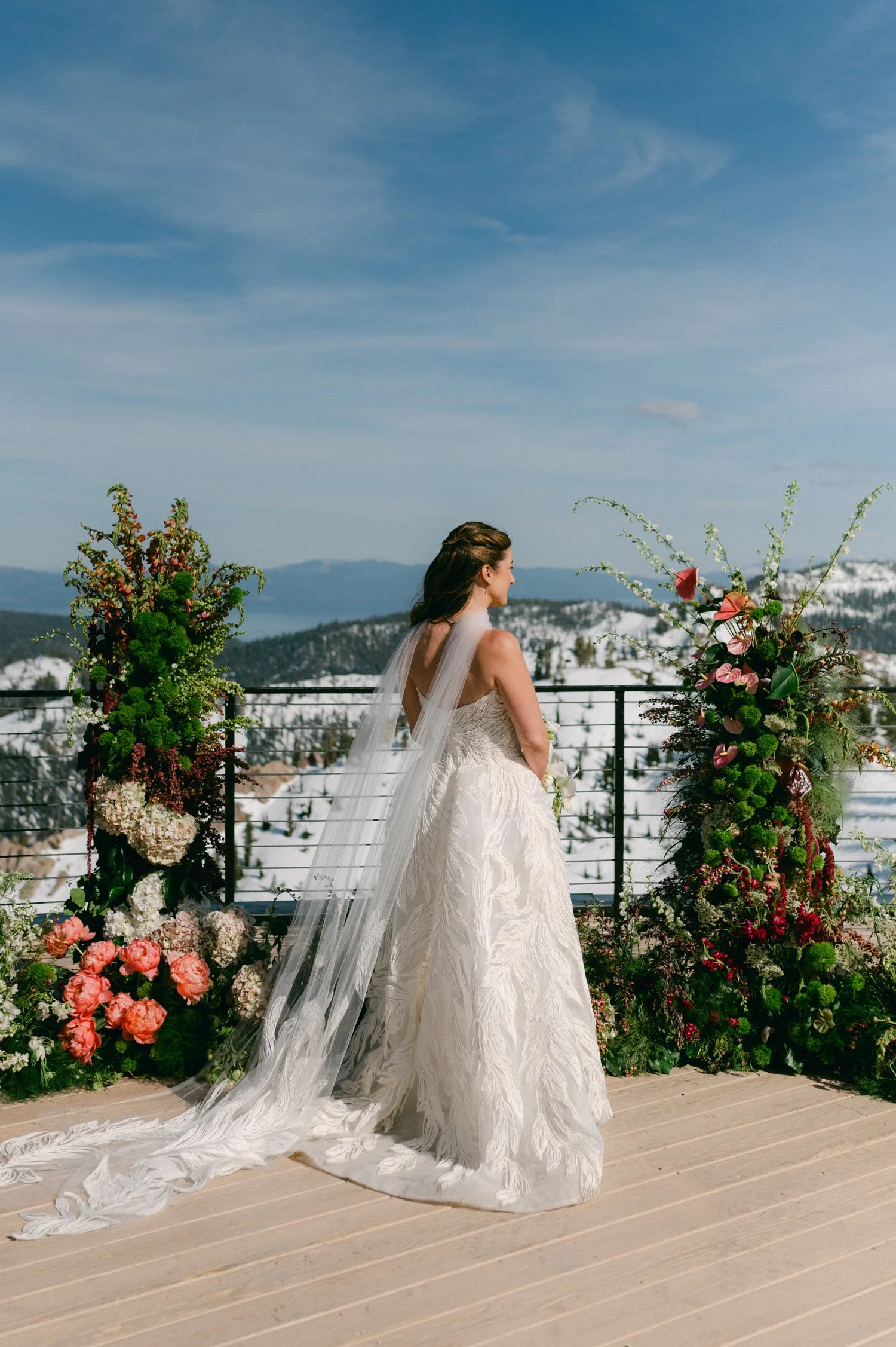 High Camp Ceremony, photo of the bride wearing an elegant bridal gown with a strapless raffia embroidered tulle ballgown. 