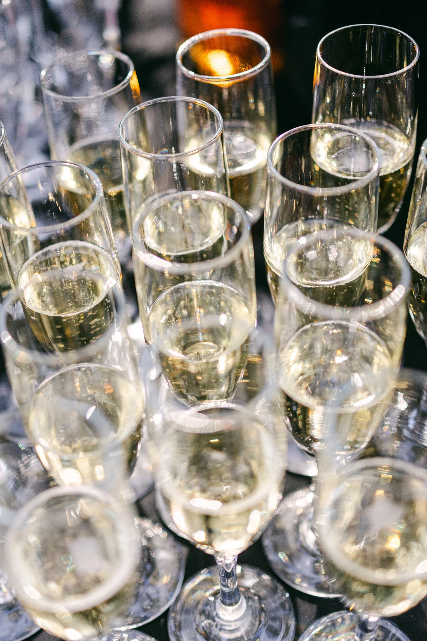 Palisades wedding venue, photo of champagne flutes filled with sparkling wine during cocktail hour