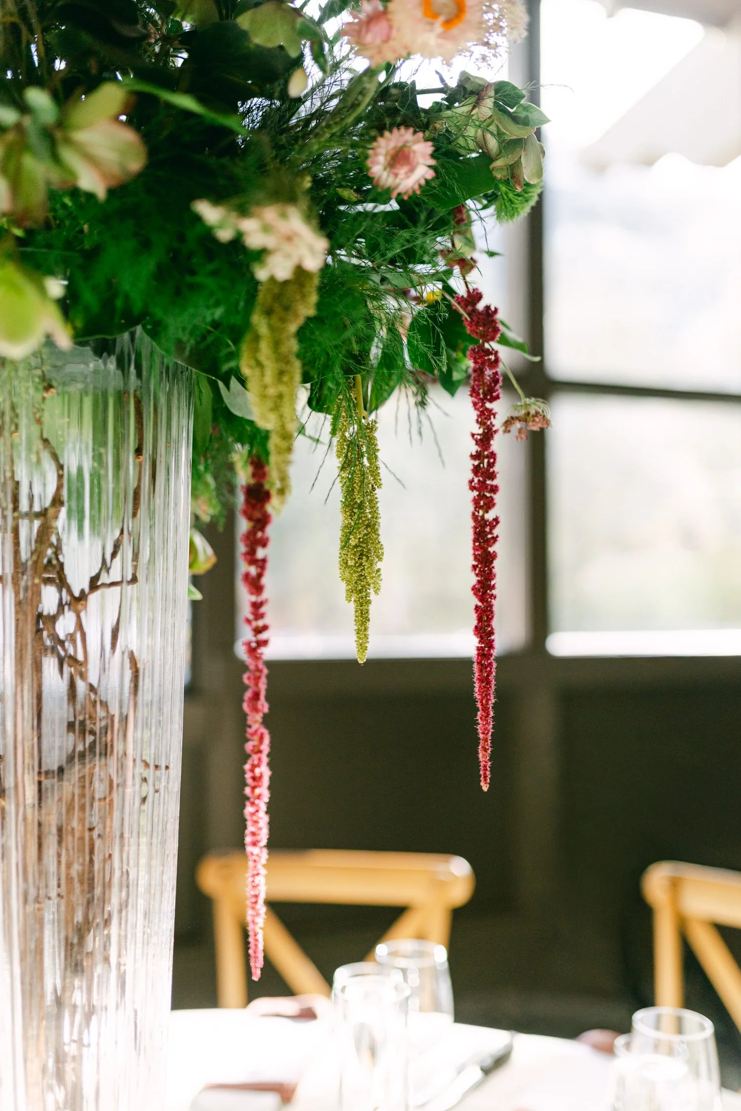 Palisades wedding venue, photo of a centerpiece with dramatic cascading blooms