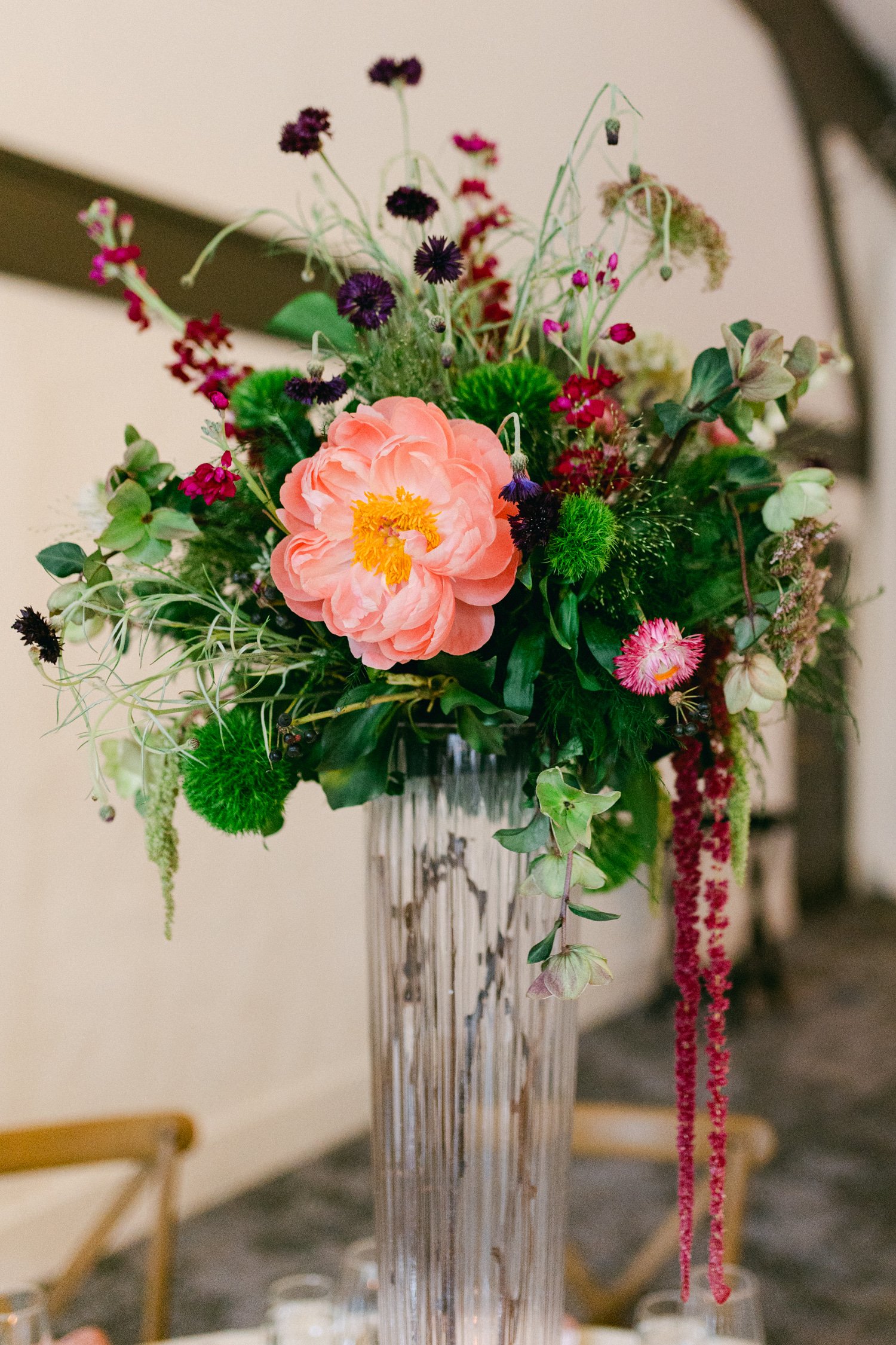 Palisades wedding venue, photo of a floral centerpiece featuring a large coral-colored peony