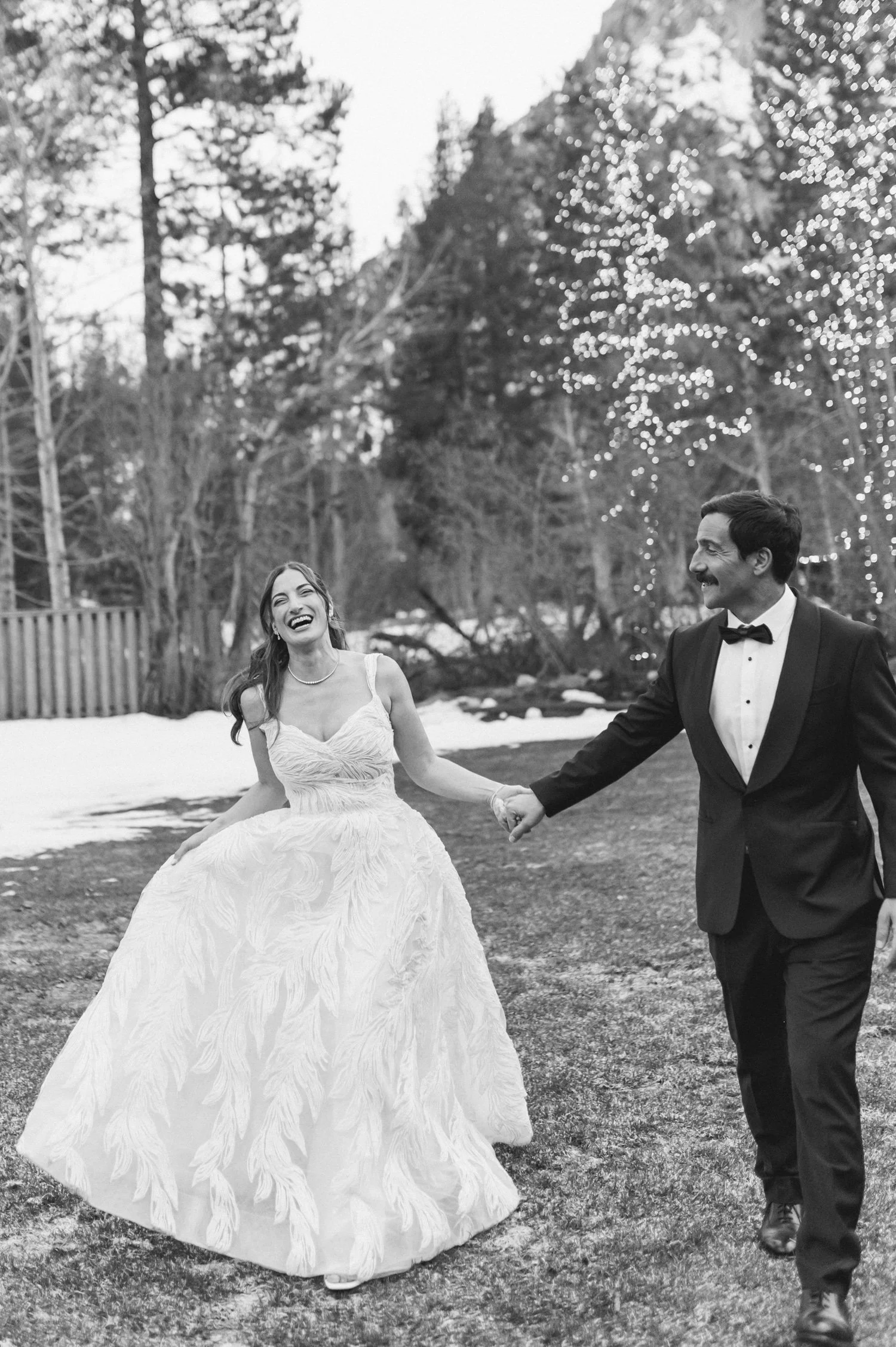 Palisades wedding venue, photo of black and white wedding photograph of the bride and a groom together in an outdoor, wooded setting.